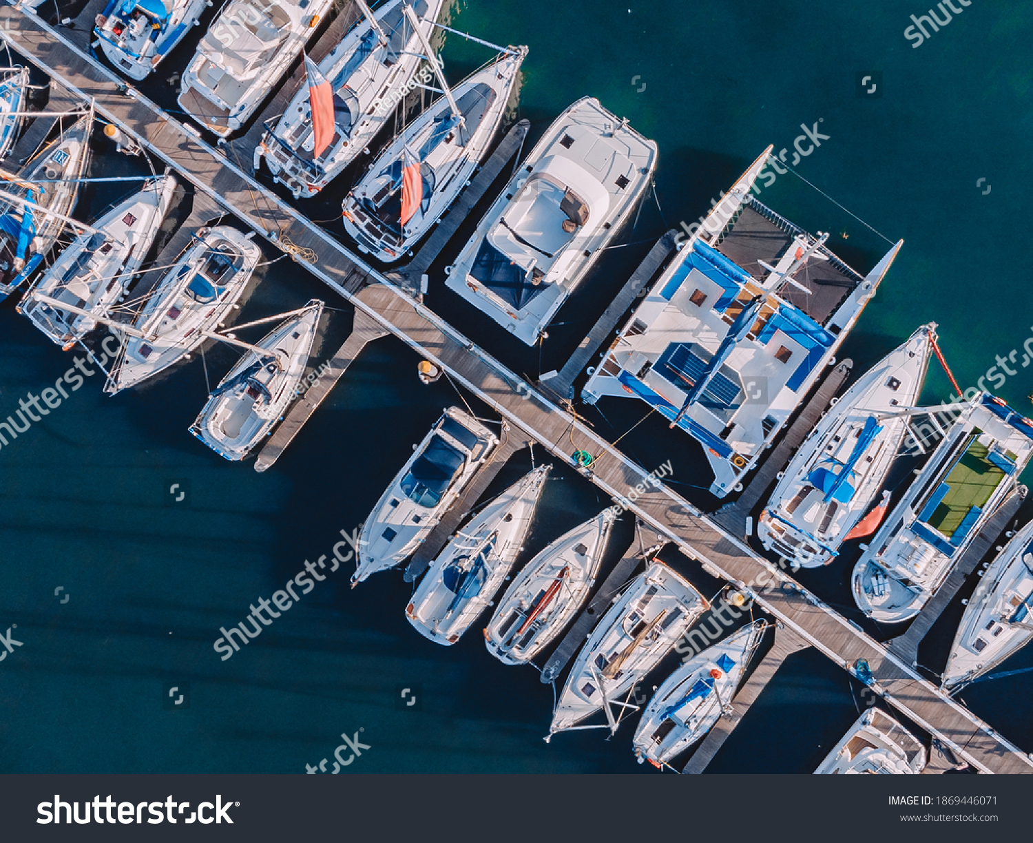 Boats docked on a marina
 #1869446071