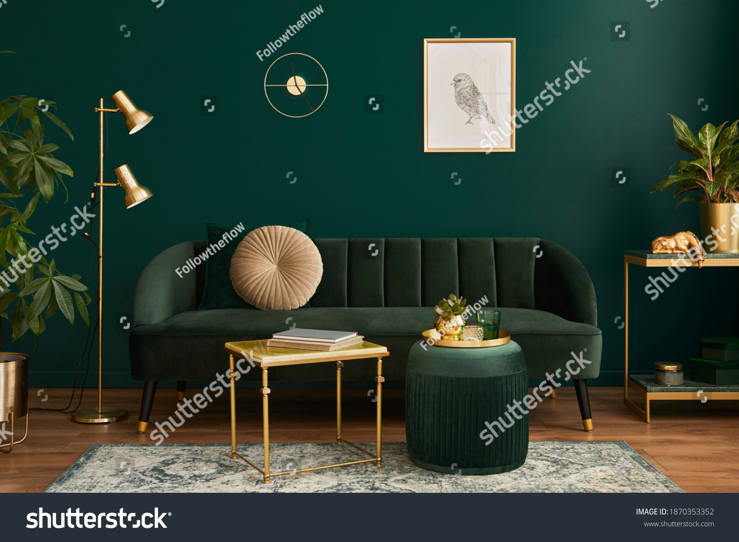 Luxury living room in house with modern interior design, green velvet sofa, coffee table, pouf, gold decoration, plant, lamp, carpet, mock up poster frame and elegant accessories. Template.  #1870353352