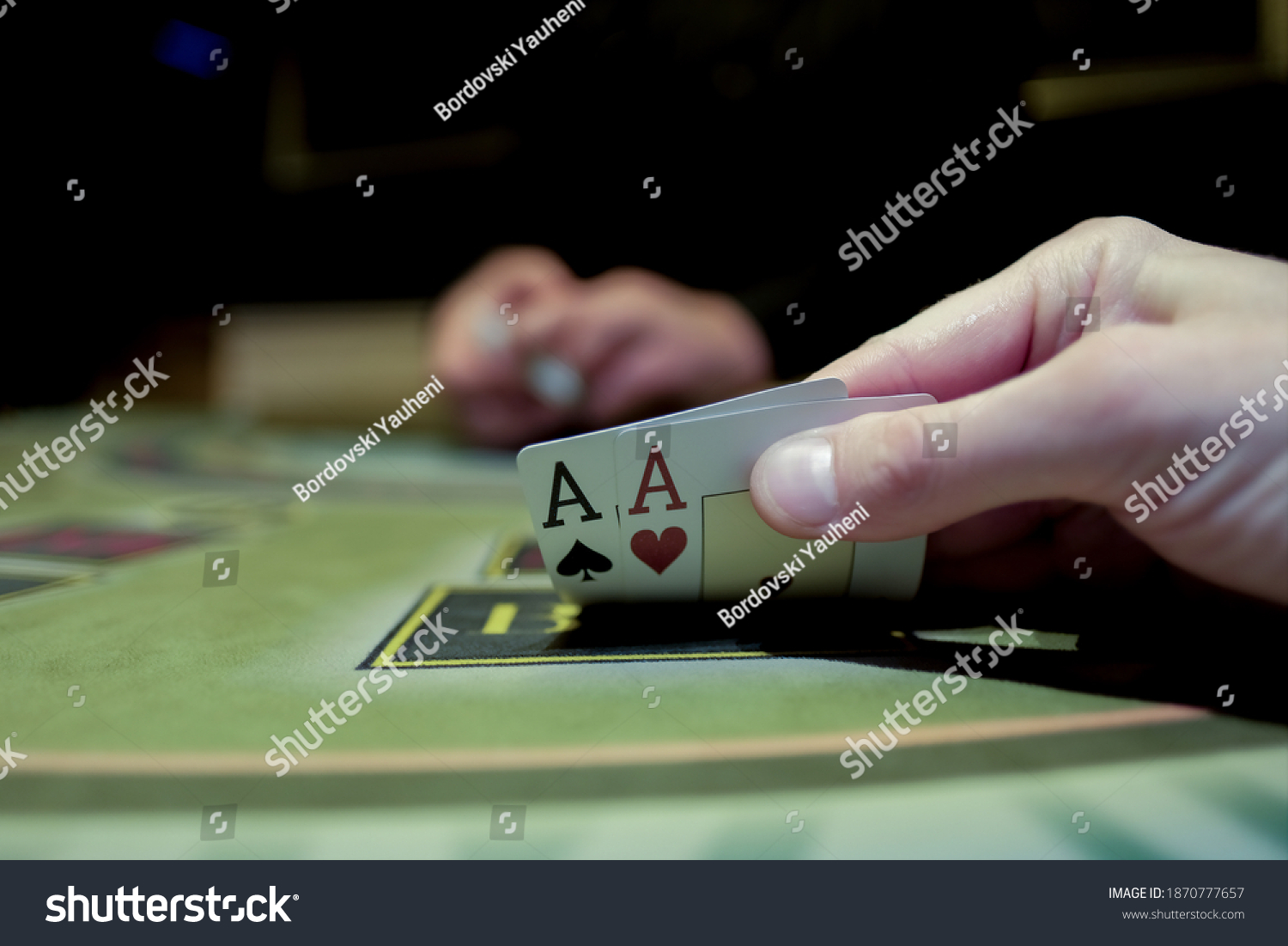 Casino interior. Card game of poker. Texas hold'em poker. The combination is a pair of aces for the player. Big win. #1870777657