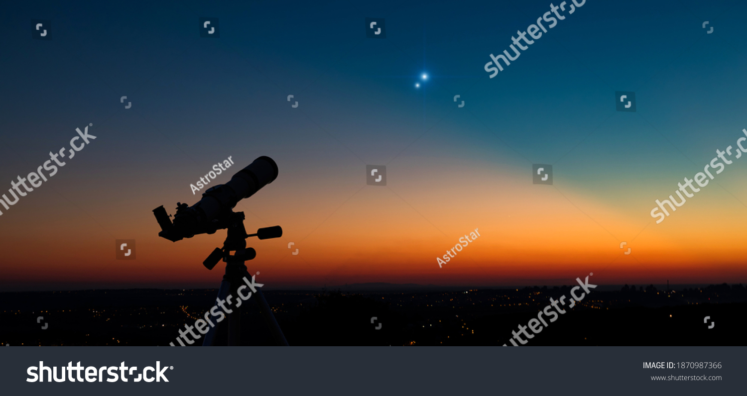 Silhouette of a astronomy telescope with twilight sky. #1870987366