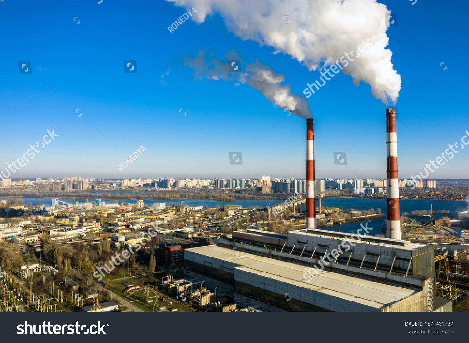 Garbage incineration plant. Waste incinerator plant with smoking smokestack. The problem of environmental pollution by factories aerial view #1871481727