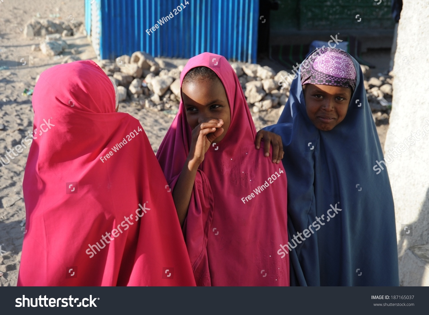 HARGEISA, SOMALIA - JANUARY 8, 2010:Unidentified Somalis in the streets of the city of Hargeysa. City in Somalia, capital of unrecognized state of Somaliland. Much of the population lives in poverty. #187165037