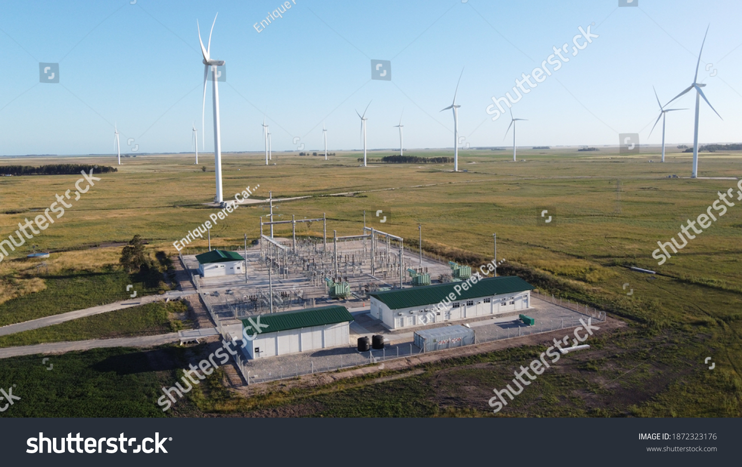 wind generators and substation with a colors sky #1872323176