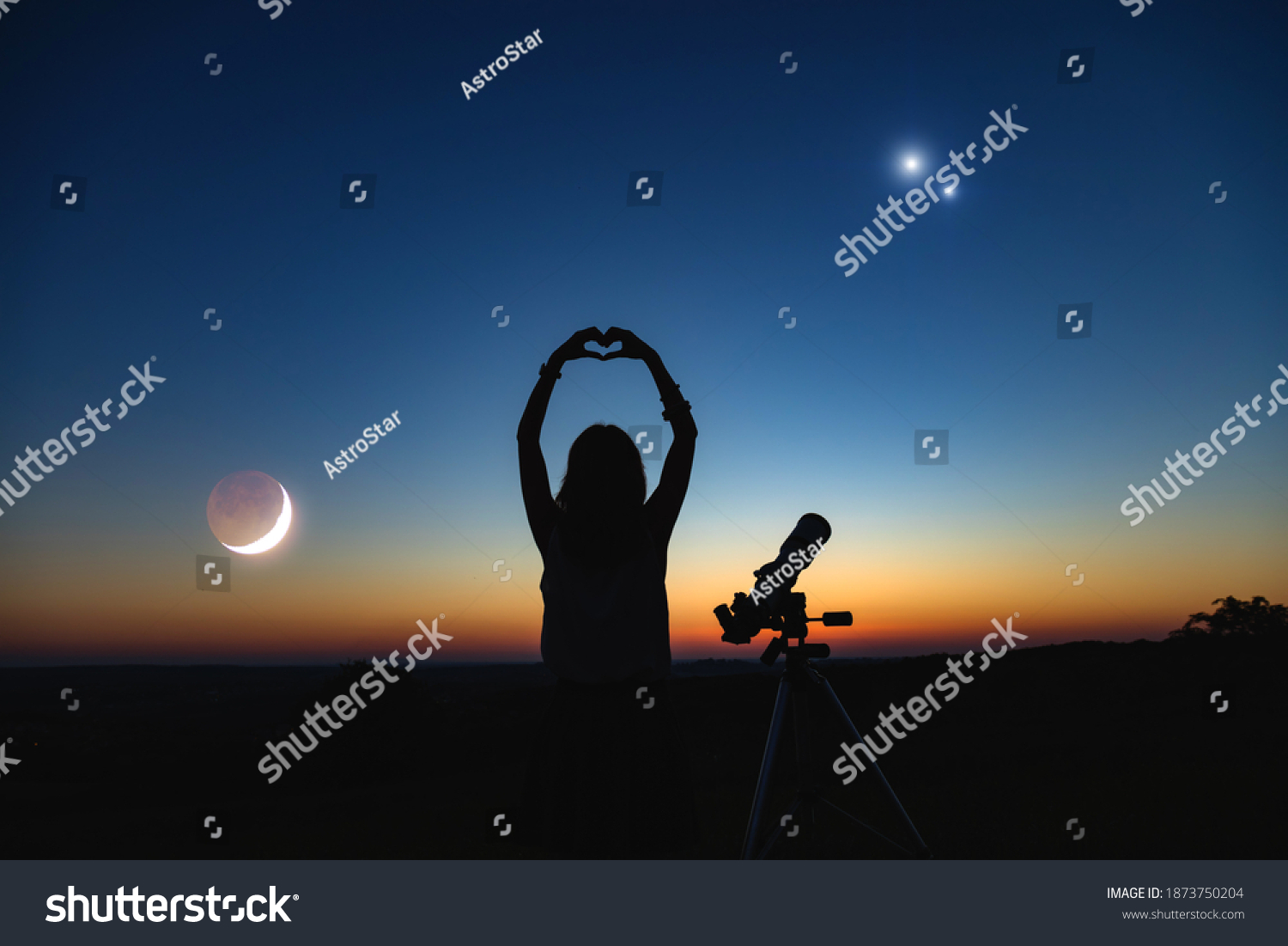 Woman looking at night sky with amateur astronomical telescope. #1873750204