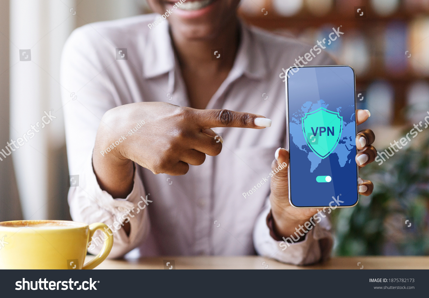 VPN App. Black Woman Pointing At Smartphone With Opened Virtual Private Network Application On Screen, African American Lady Enjoying Modern Technologies For Syber Security, Creative Collage, Closeup #1875782173