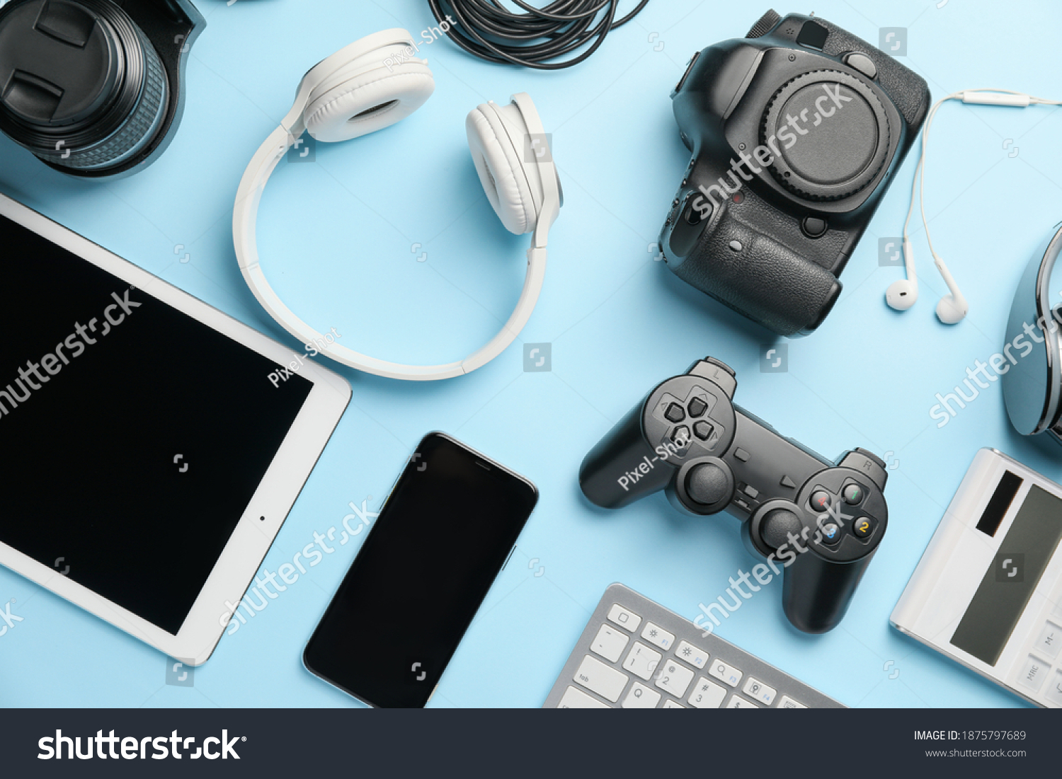 Different modern devices on color background #1875797689