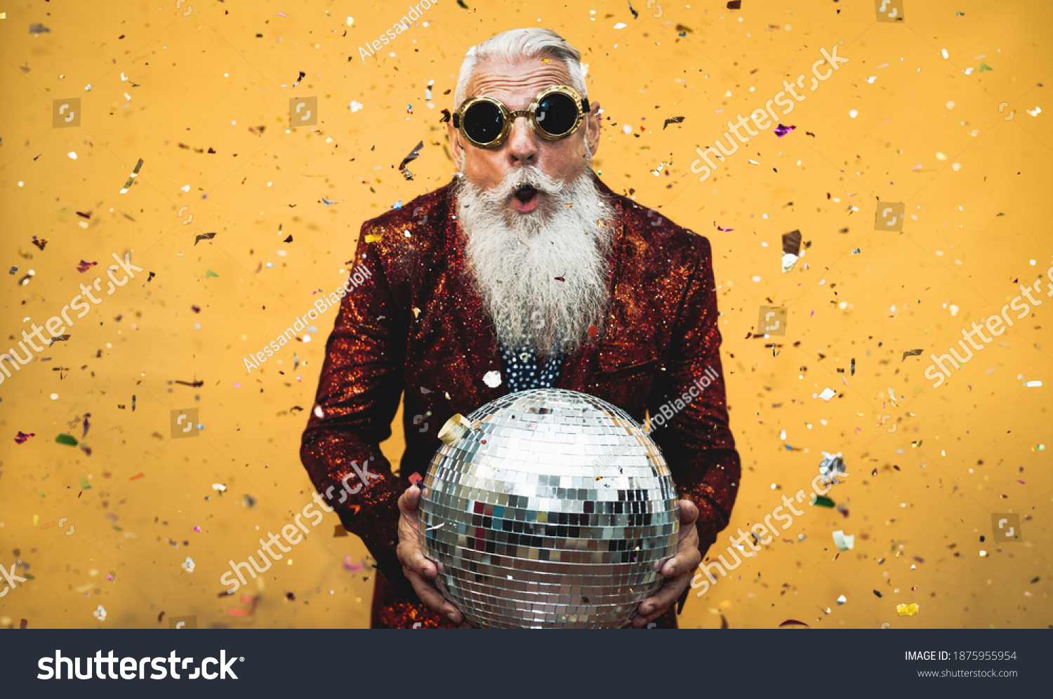Crazy senior man having fun doing party during holidays time - Elderly people celebrating life concept  #1875955954