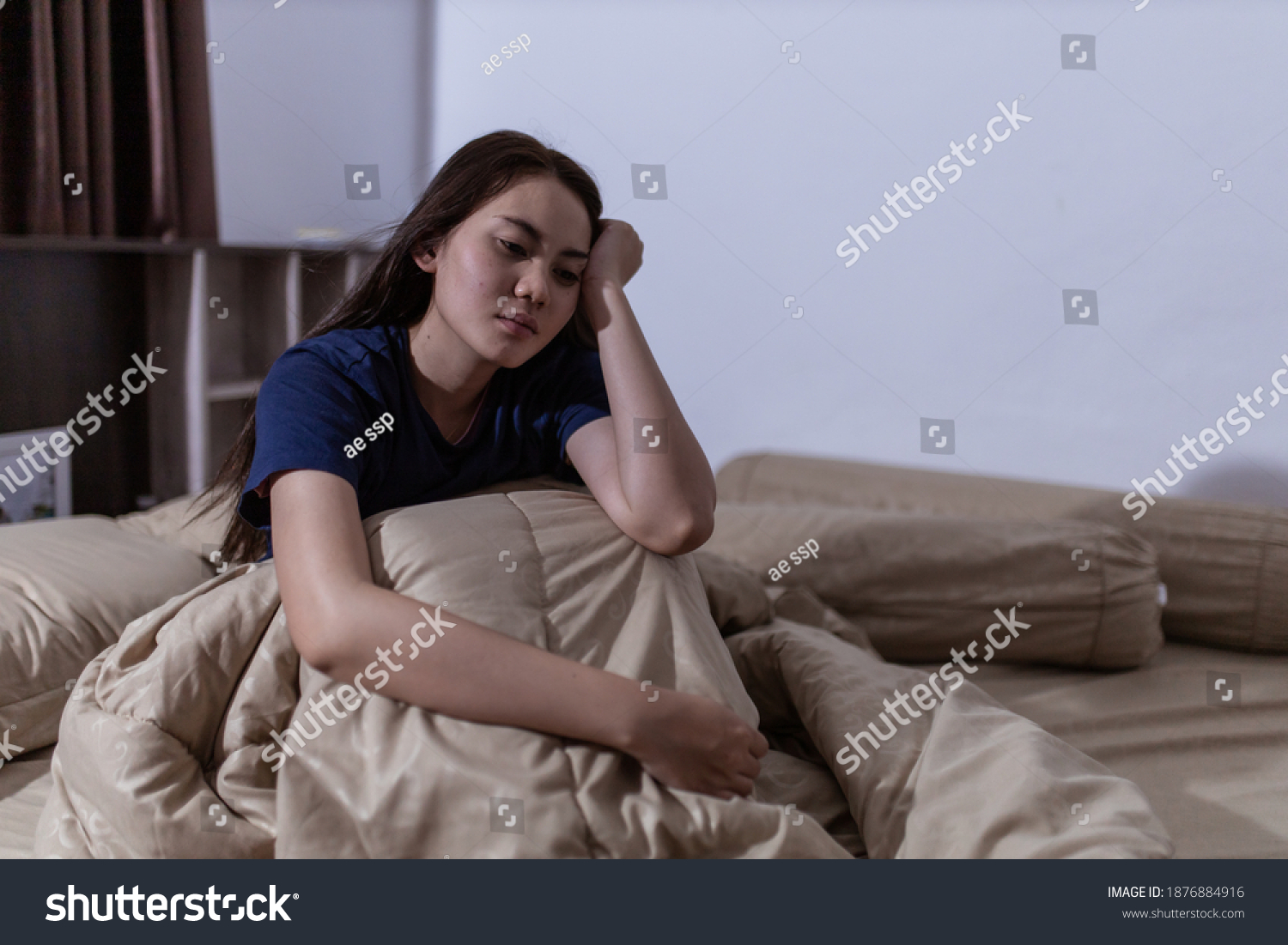 Young asian woman cannot sleep insomnia late at night. Can't sleep. Sleep apnea or stress. Sleep disorder concept. #1876884916