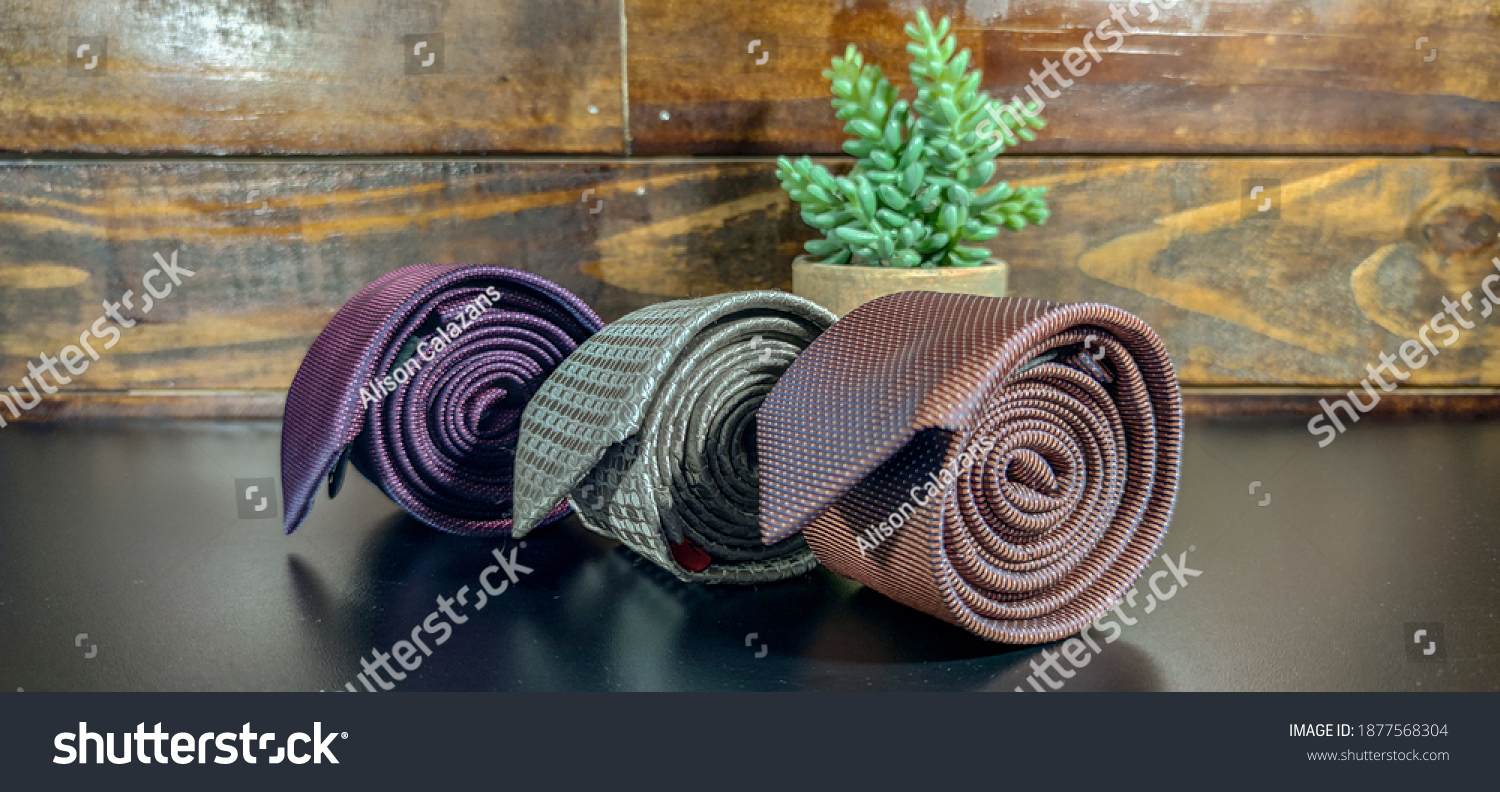 Perfect necktie close up. Shopping concept. Personal stylist service. Stylist advice. Matching necktie with outfit. Pick necktie. Different color necktie. Menswear clothes and accessories. #1877568304