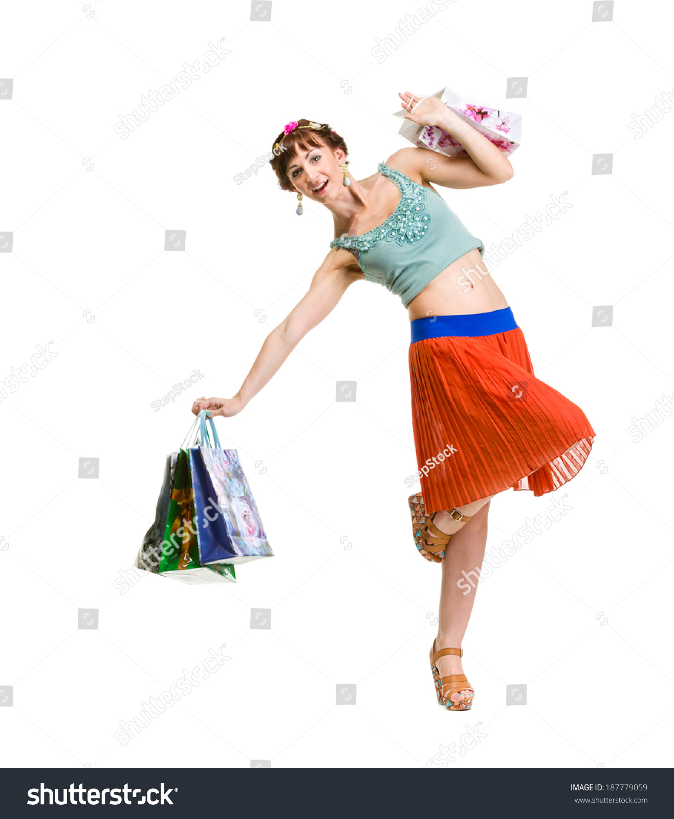 picture of lovely woman with shopping bags Isolated over white. #187779059