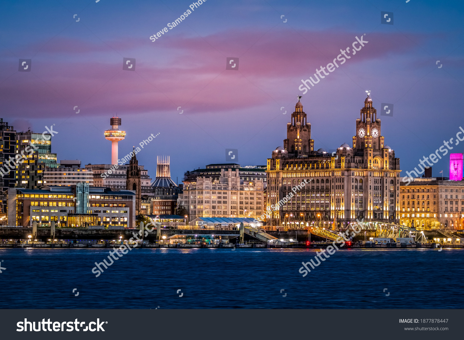 Liverpool waterfront illuminated at dusk