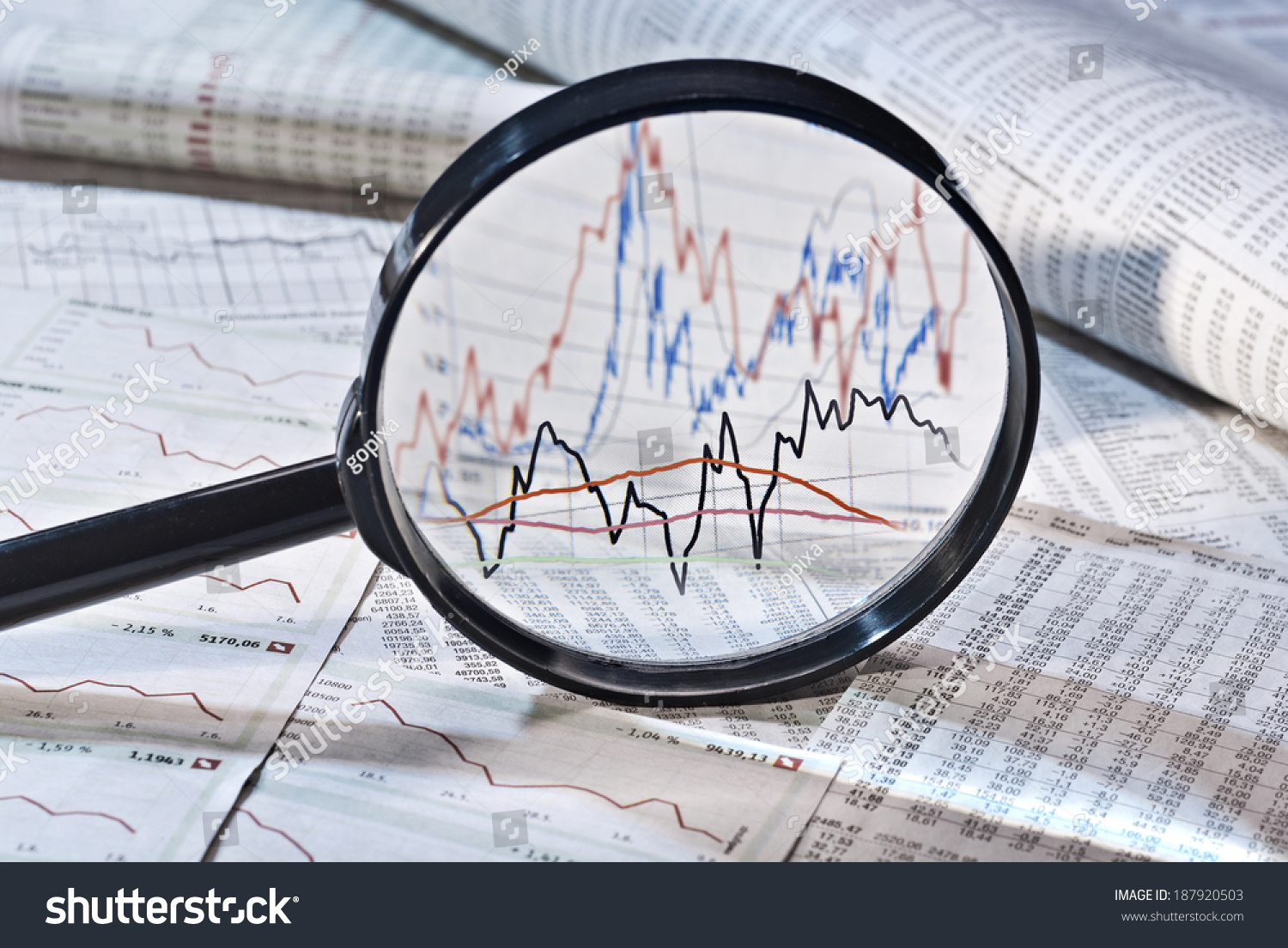 Magnifier shows the variation of stock prices, #187920503
