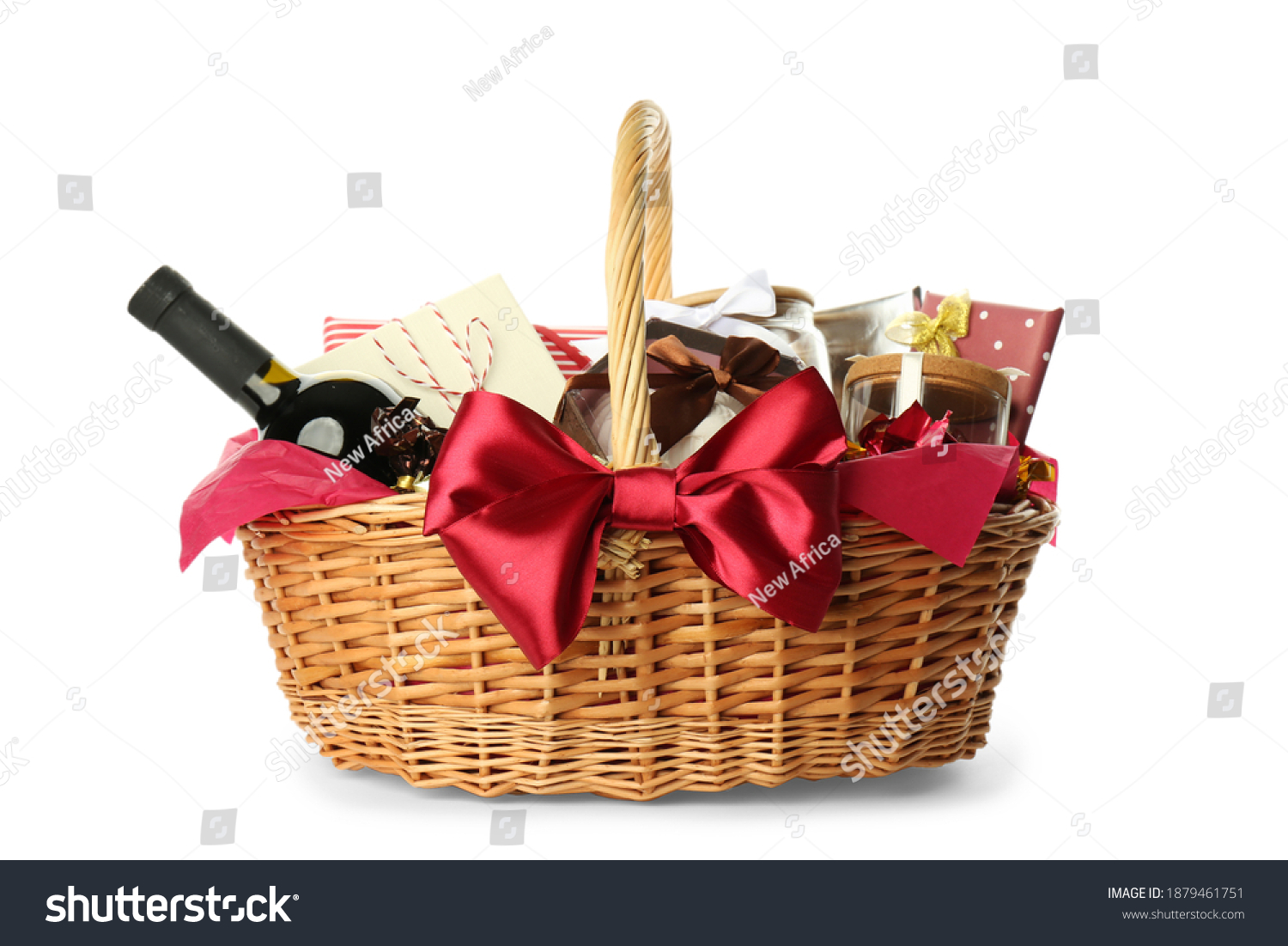 Wicker basket full of gifts isolated on white #1879461751