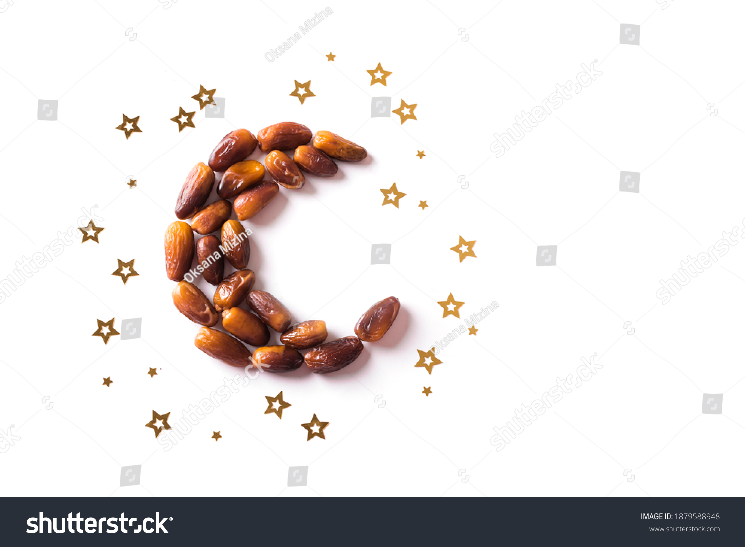 Islamic Crescent. Ramadan kareem with dates fruits arranged in shape of crescent moon isolated on white background, top view, copy space. Iftar food concept. #1879588948