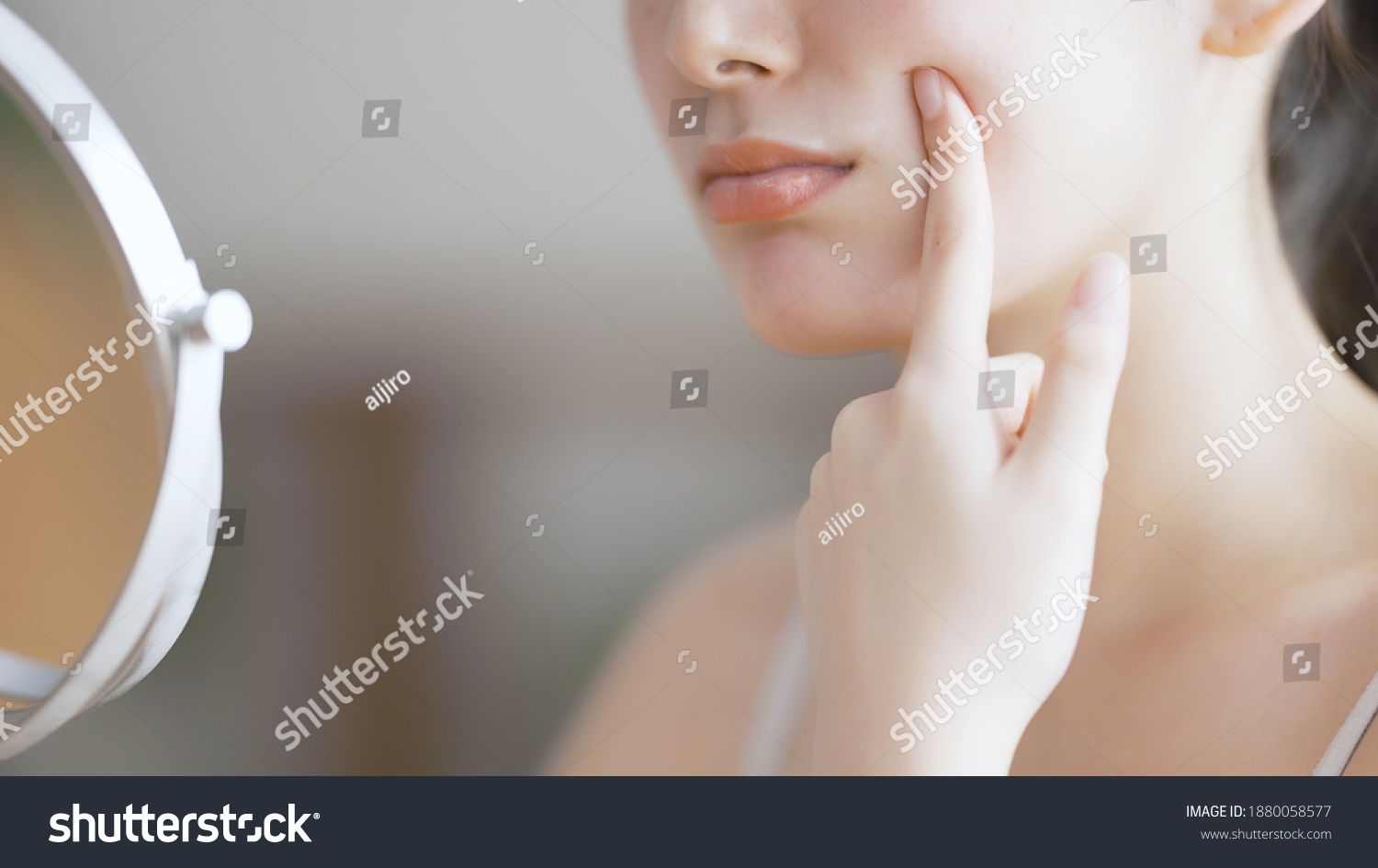 Young woman doing skin care #1880058577