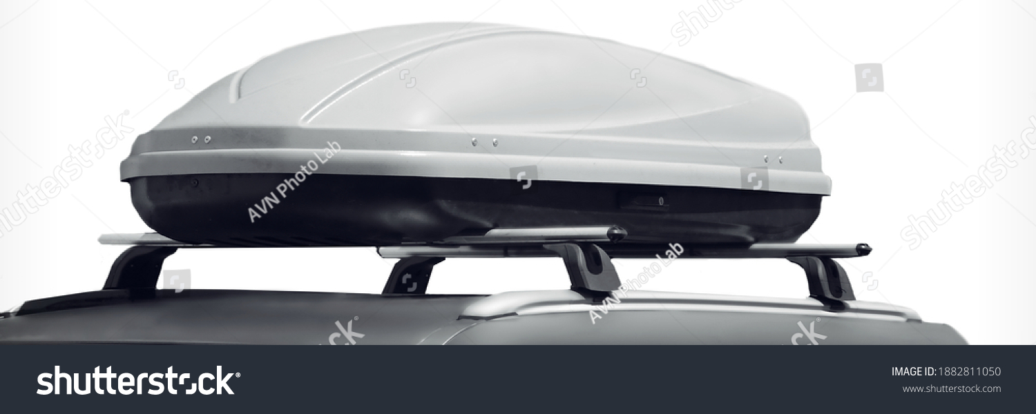 Car With Trunk Box Isolated On White Background. SUV Car Roof With Luggage Box On Rooftop On The Rack System Isolated. Closeup Of Roadster Car Roof Box And Rack System On Rooftop. #1882811050