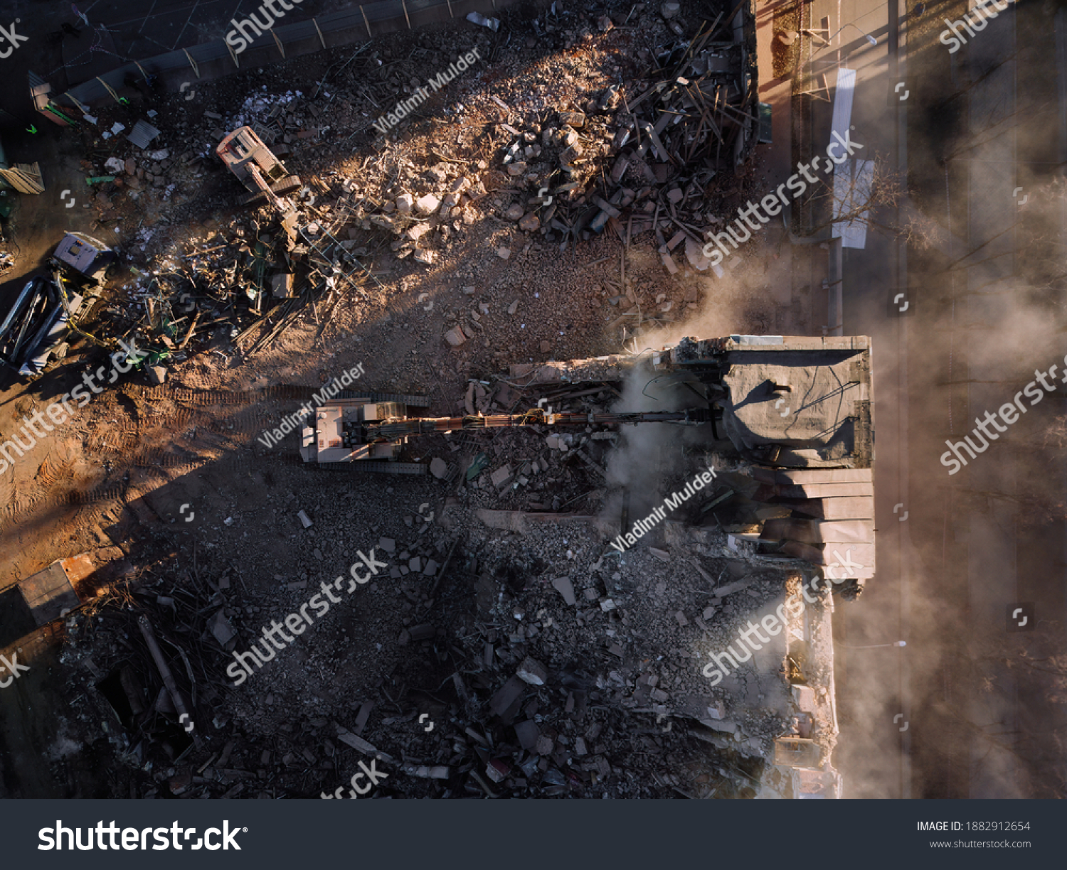 Aerial view of demolition site. Process of demolition of old industrial building #1882912654
