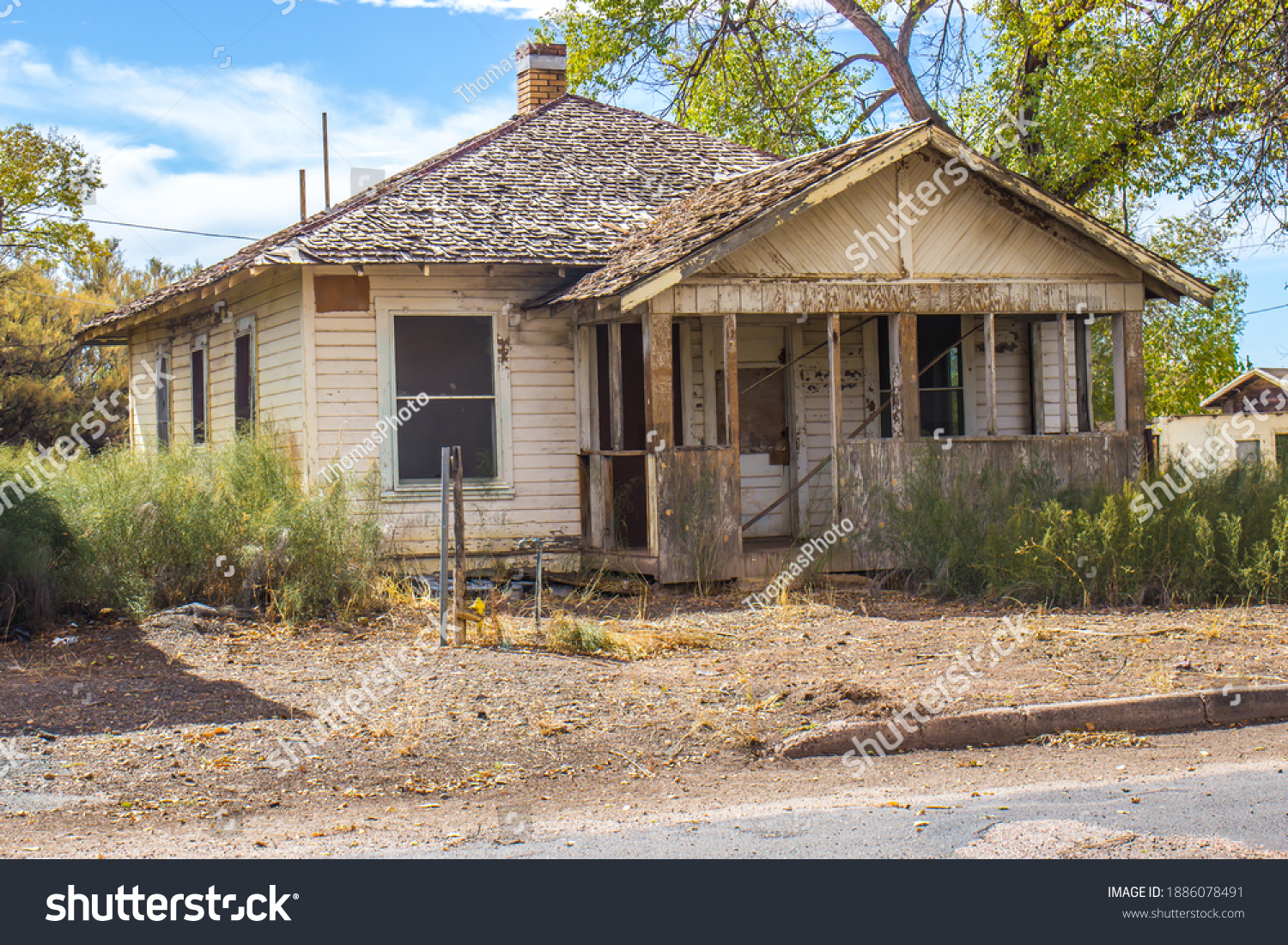 Old Abandoned One Level House In Disrepair #1886078491