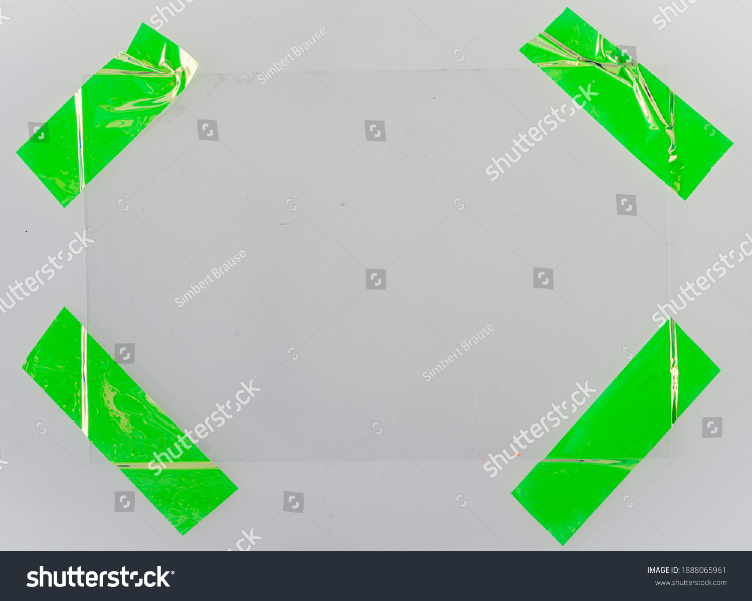shiny green foil sticker snips on white background with real corner edge bulge, design elements for your social media collage, blend in your photo here. #1888065961