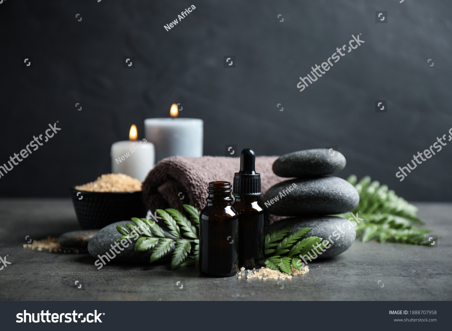 Spa composition with aroma oil on grey table #1888707958