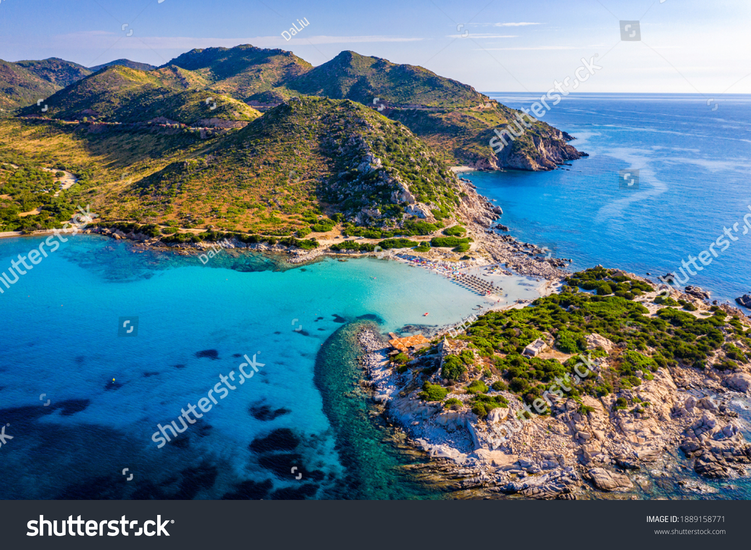 Cost of Sardinia: Peninsula of Punta Molentis. View of beautiful beach at Punta Molentis, Villasimius, Sardinia, Italy. Beautiful bay with sandy beach at Punta Molentis, Sardinia island, Italy. #1889158771