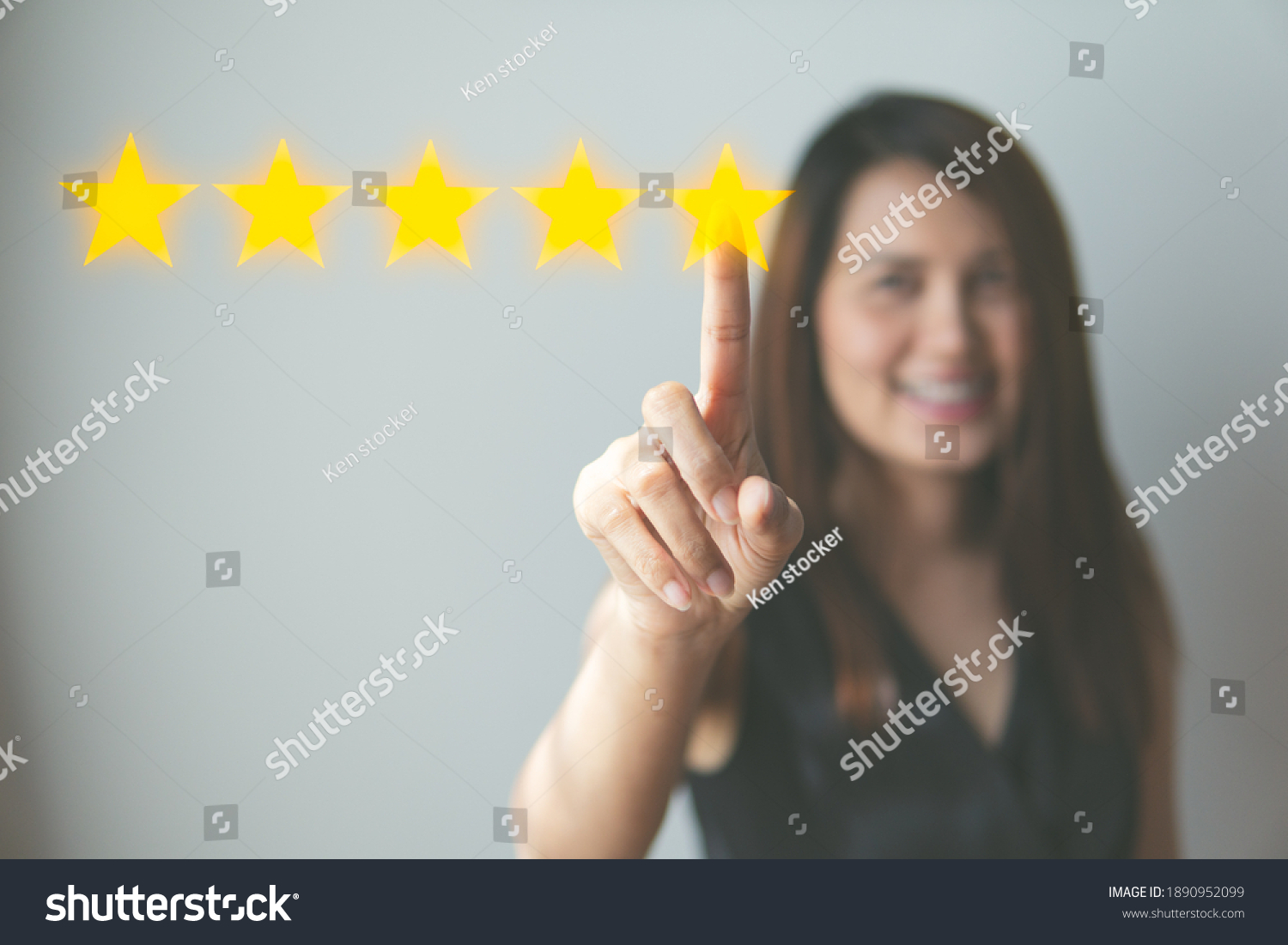 Customer review good rating concept hand pressing five star on visual screen and positive customer feedback testimonial. #1890952099