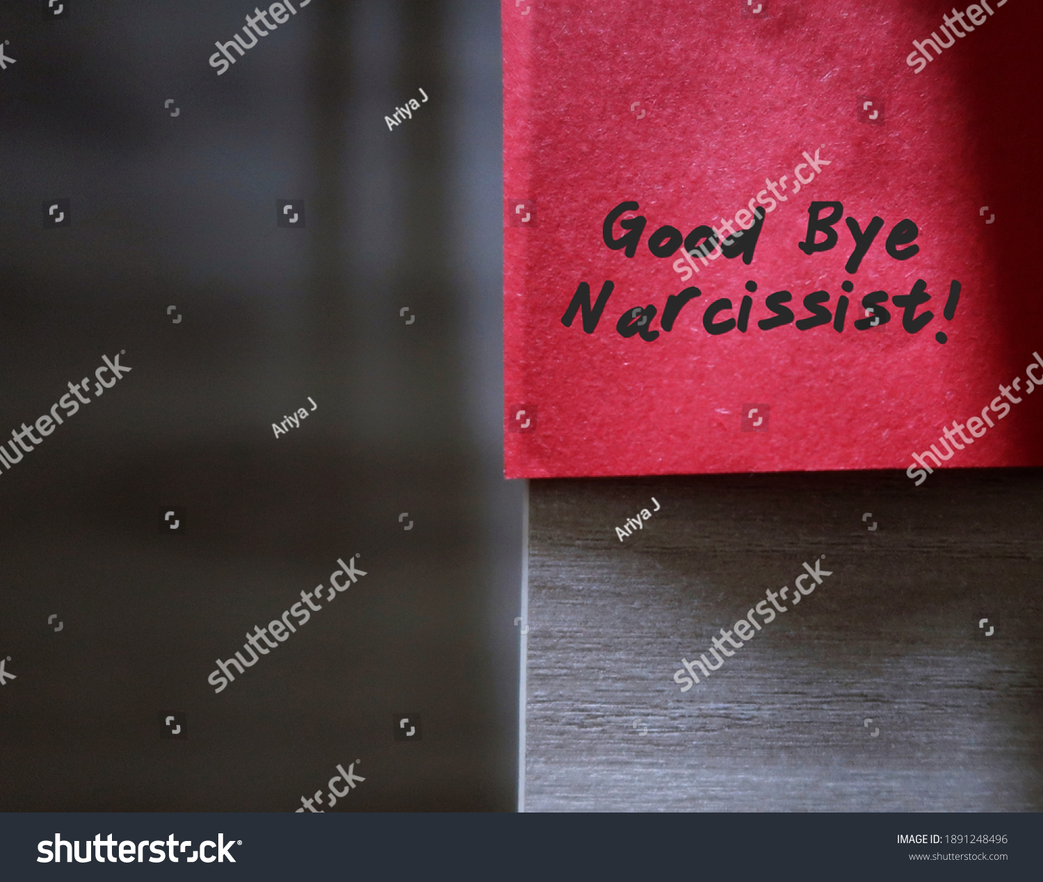 Red sticky note with text written GOOD BYE NARCISSIST , concept of stay away from narcissist ,people who obsess too much in themselves and lack of empathy #1891248496