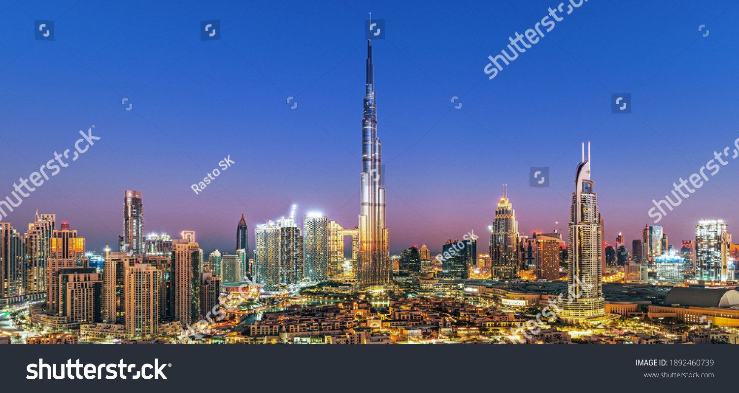 Dubai - city center skyline and bussy evening after sunset with colorful sky, United Arab Emirates #1892460739