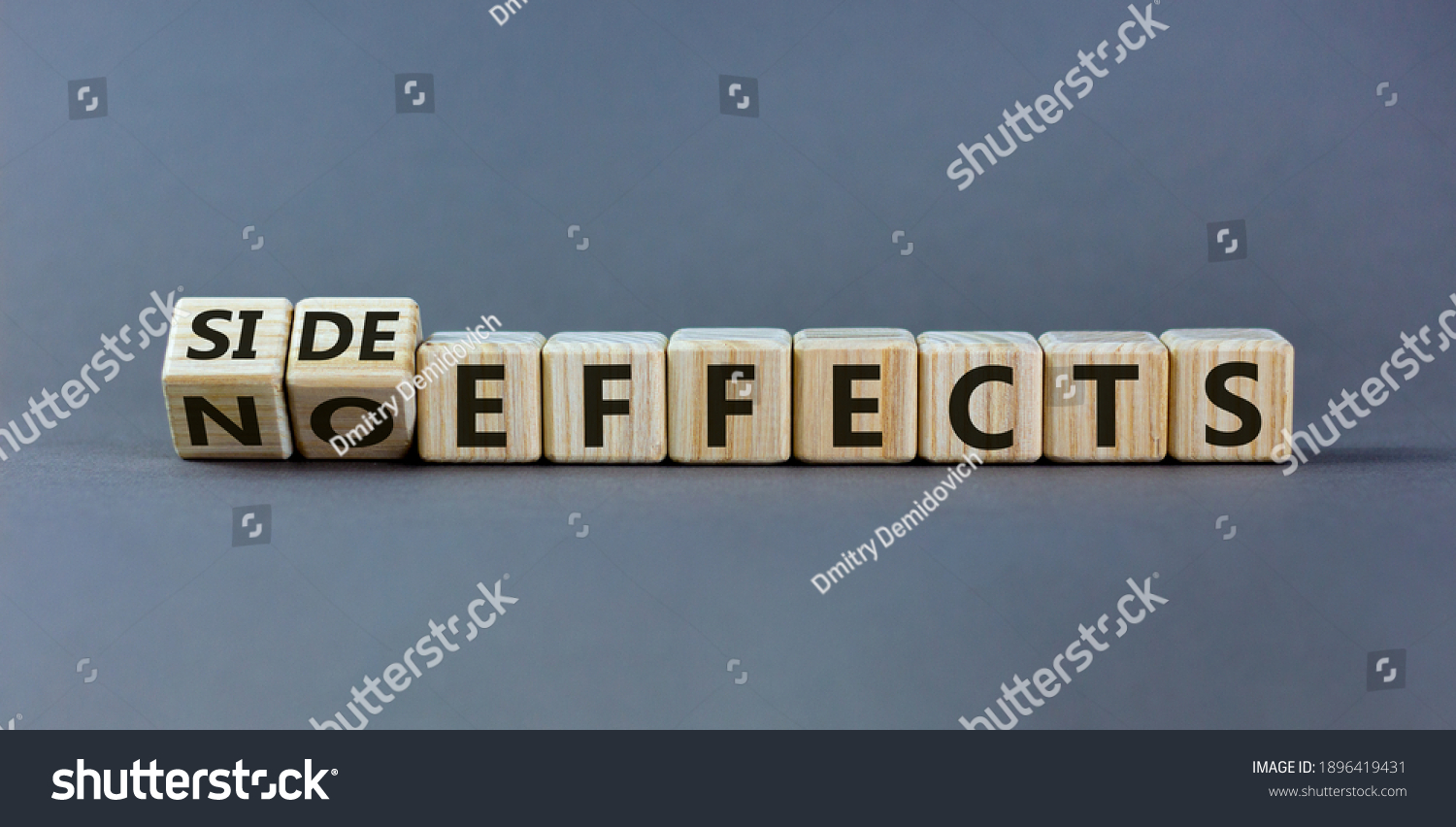 Side or no effects symbol. Turned wooden cubes and changed words 'no effects' to 'side effects'. Beautiful grey background, copy space. Medical, covid-19 pandemic corona side effects concept. #1896419431
