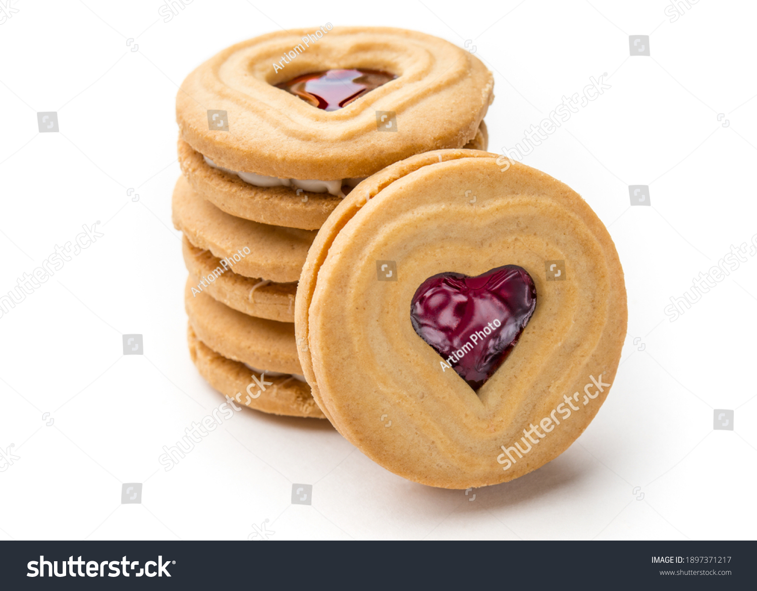 Cookies. Cookie Hearts shape Red jam or strawberry jelly inside biscuit cookie. Homemade baking. Sweet bakery. Top view on white background. #1897371217