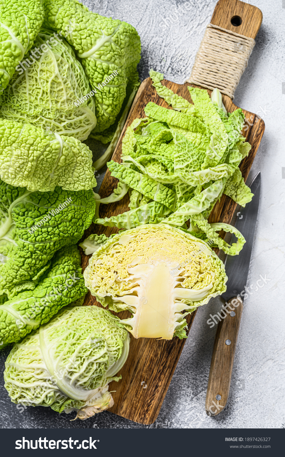 Sliced Savoy cabbage from organic grower farm. White background. Top view. #1897426327