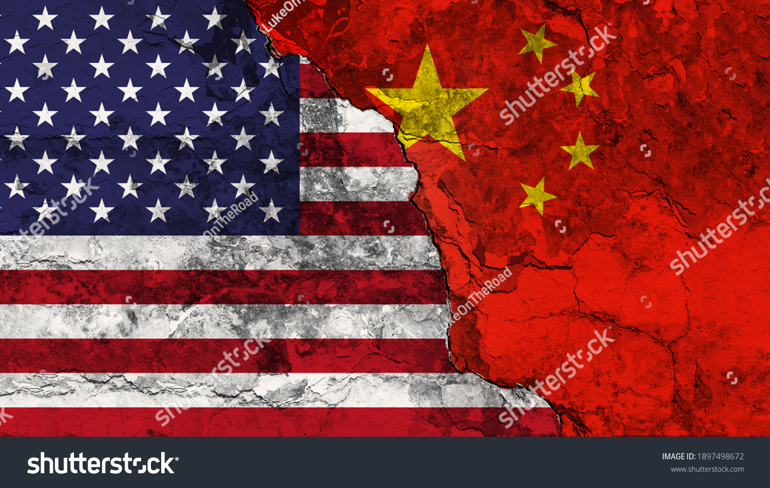 Concept of the Conflict between the United States of America and the Peoples Republik of China with painted flags on a wall with a crack #1897498672