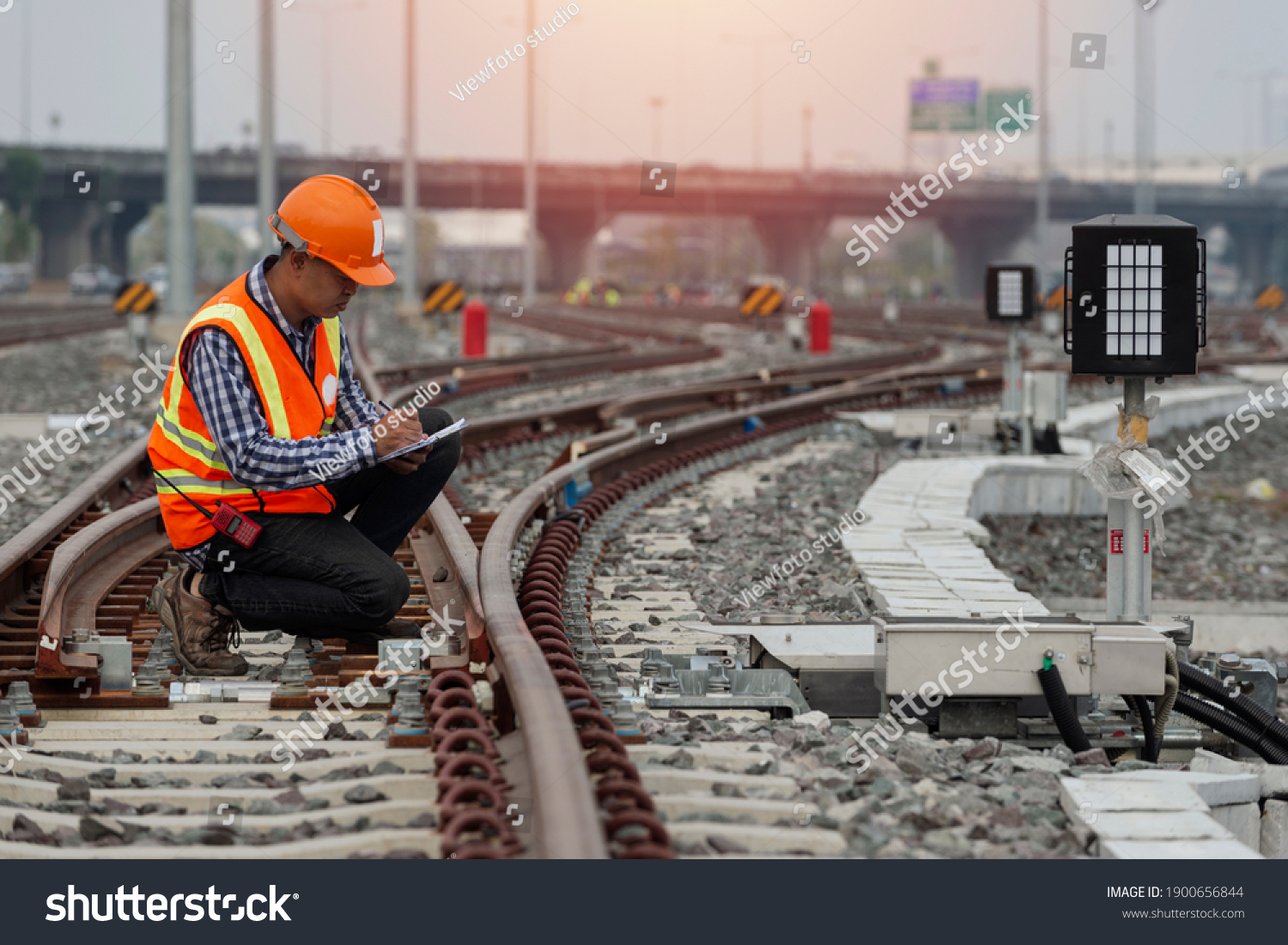 engineer Sitting on railway inspection. construction worker on railways. Engineer work on railway. rail, engineer, Infrastructure #1900656844
