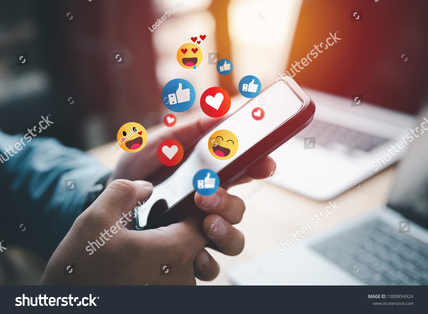 Social media and digital online concept, man using smart phone with Social media. The concept of living on vacation and playing social media. Social Distancing ,Working From Home concept. #1900894924