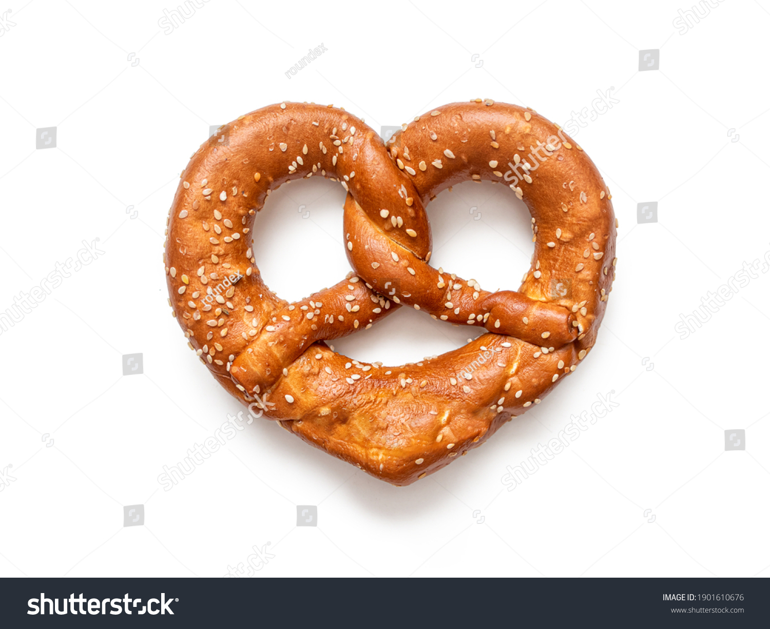 Brezel - a pretzel sprinkled with sesame seeds, in the form of "crossed arms", widely distributed in southern Germany, isolated on a white background #1901610676