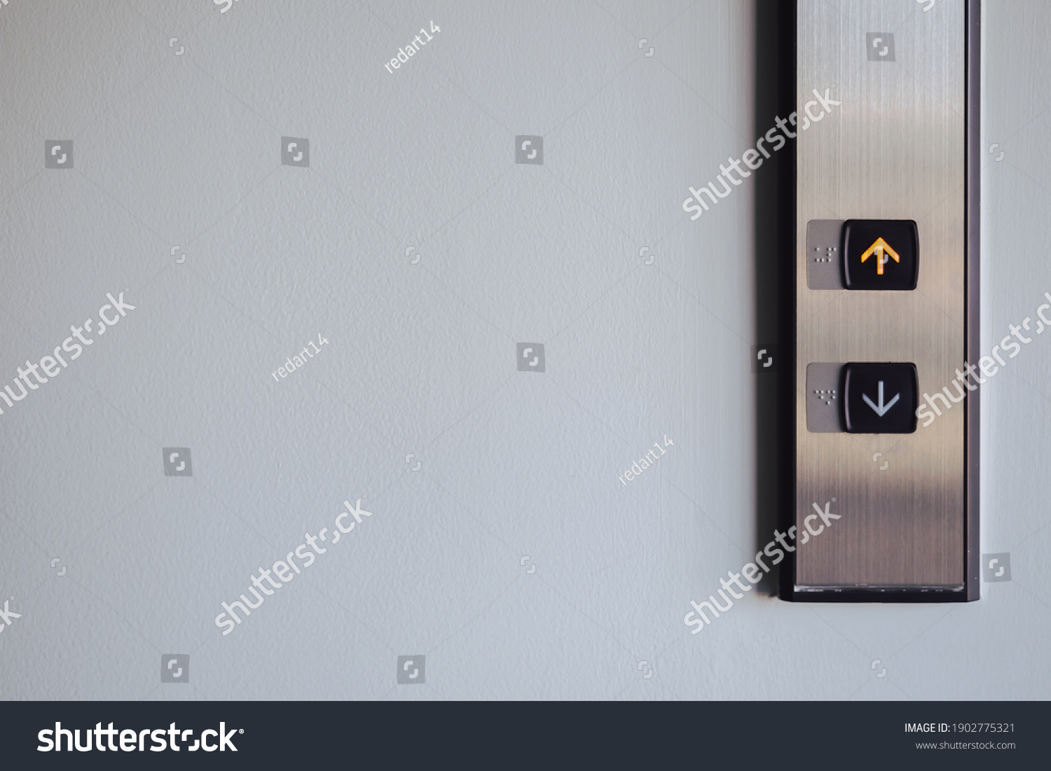 Up and down button in front of the Elevator for direction, up red light with copy space #1902775321