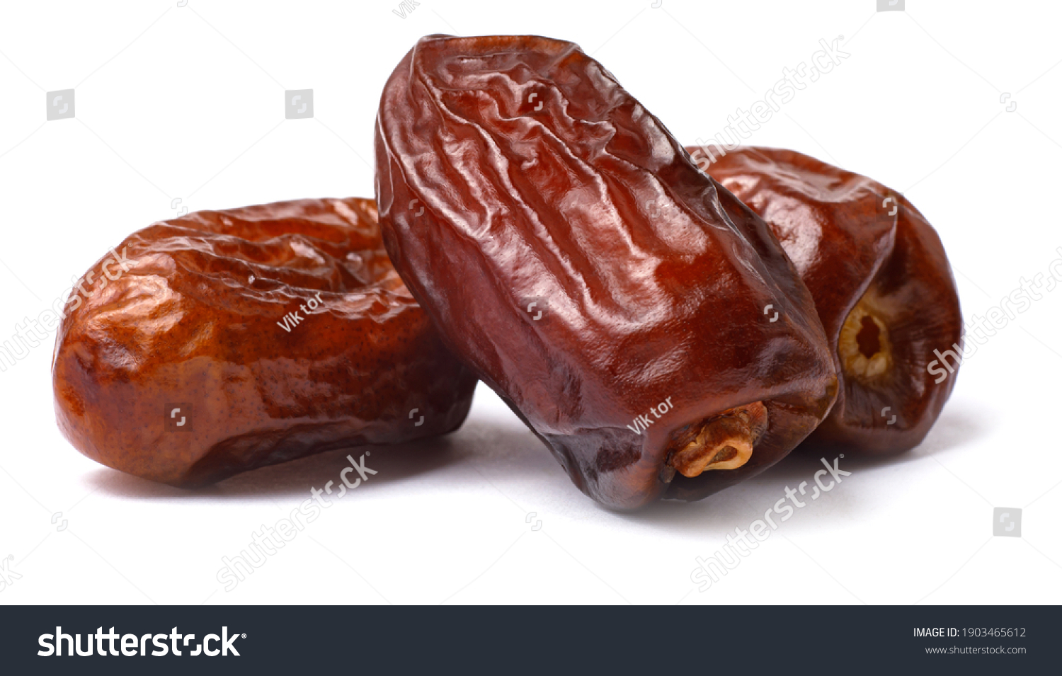 Pile of tasty dry dates isolated on white background. Arabic food #1903465612