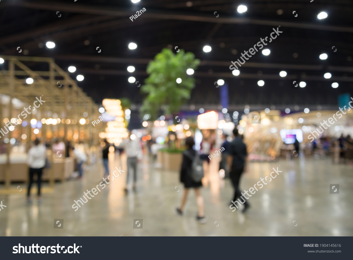 Abstract blur people in exhibition hall event trade show expo background. Large international exhibition, convention center, business marketing and event fair organizer concept. #1904145616