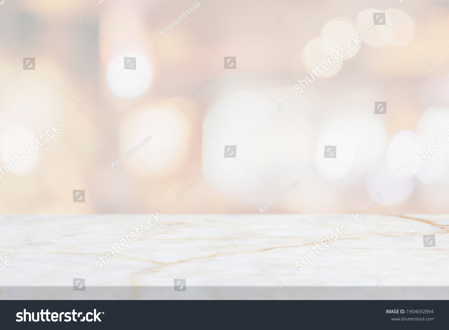 marble table top with blurred abstract cafe restaurant interior background #1904692894