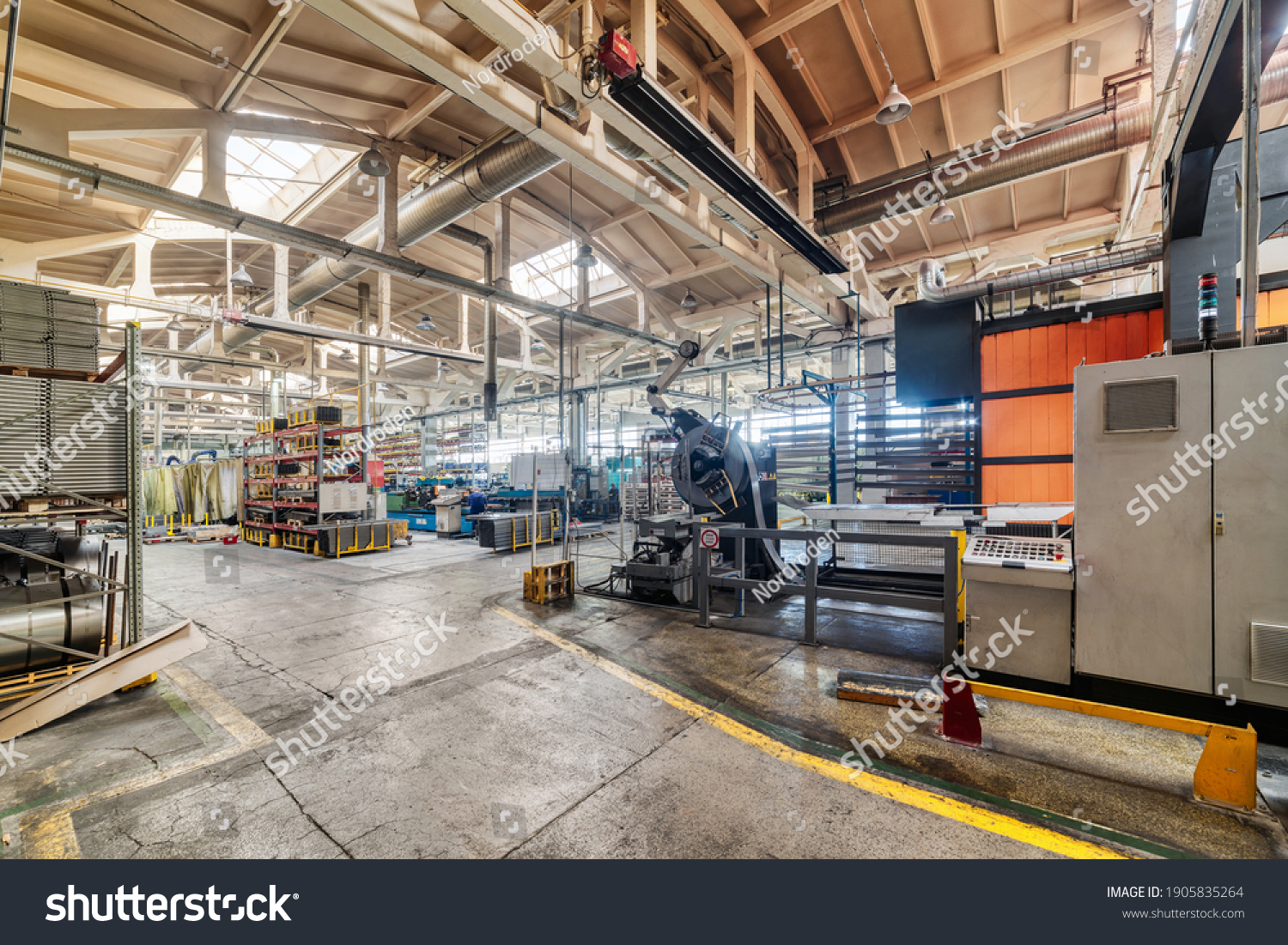 The interior of the metalworking shop. The interior of the metalworking shop. Modern industrial enterprise. #1905835264