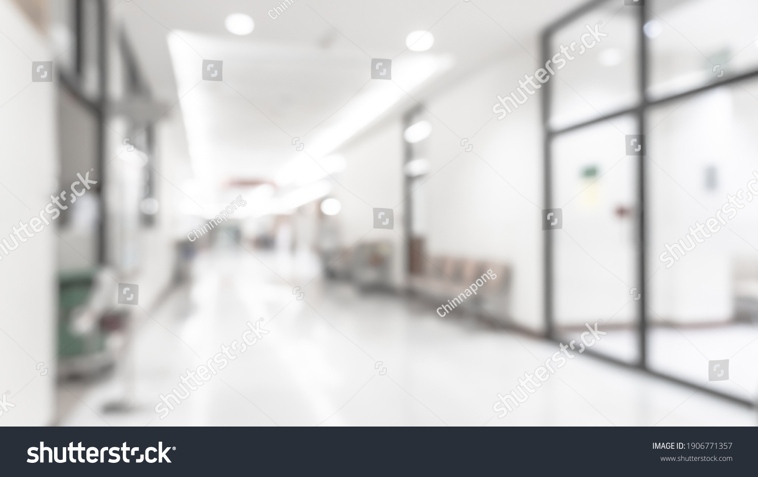 Medical clinic blur background hospital service center in patient’s ward blurry perspective view of interior white room, lab corridor hallway, lobby or walkway for nursing care healthcare service #1906771357