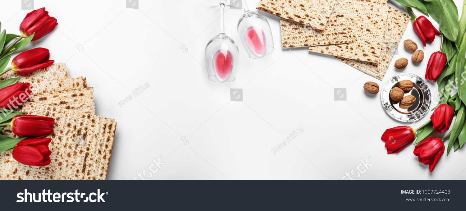 Flat lay composition with matzos on white background, space for text. Passover (Pesach) celebration #1907724403