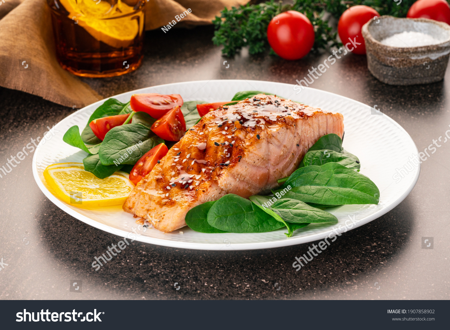 Baked or fried salmon and salad, Paleo, keto, fodmap, dash diet. Mediterranean food with steamed fish. Oven asian dish with teriyaki. Healthy concept, gluten free, lectine free, side view #1907858902