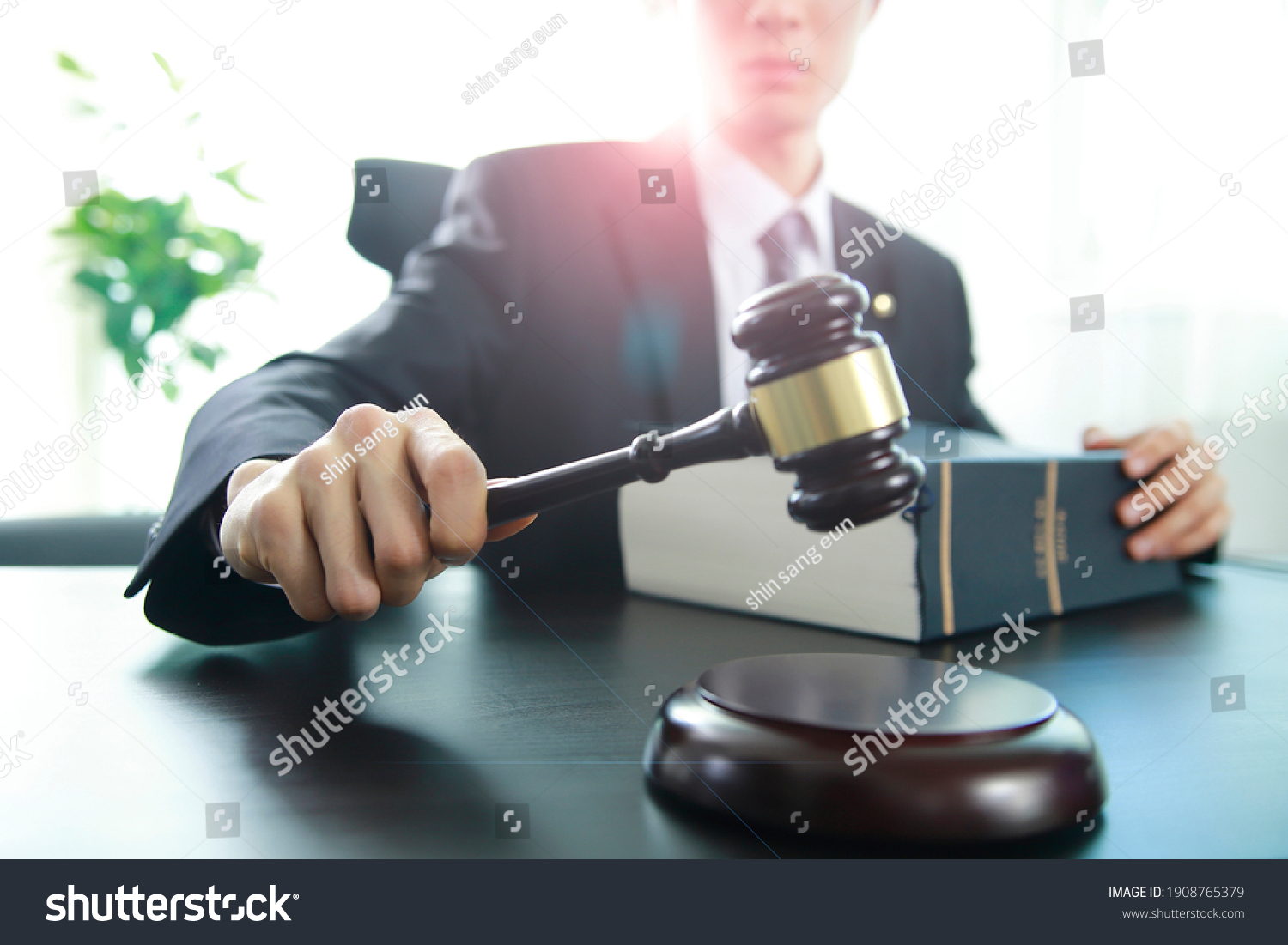 Justice lawyer holding judge gavel, Businessman in suit or lawyer, Advice and Legal services Concept.
 #1908765379