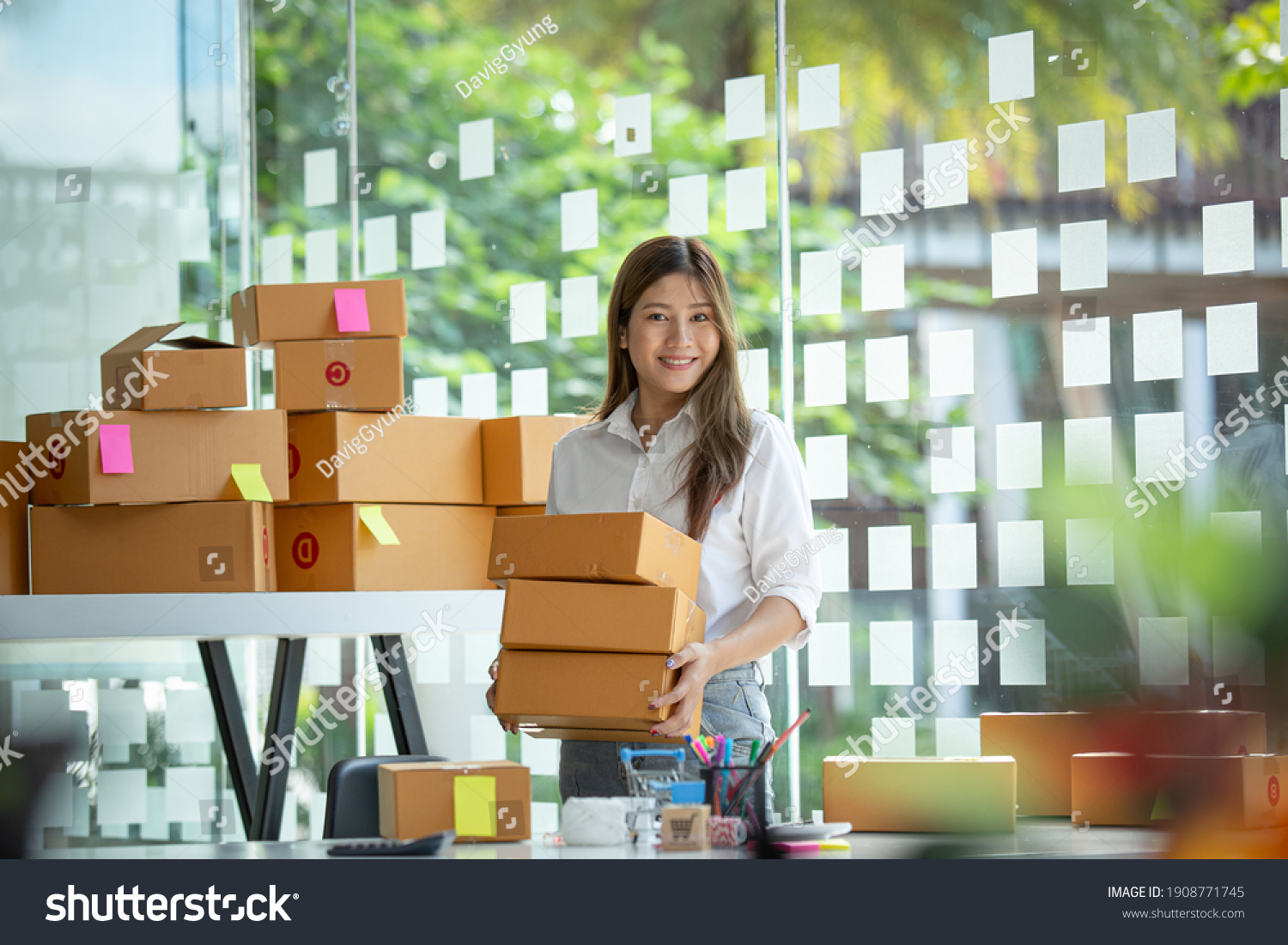 Portrait of young business asian woman online working in office desk use computer copyspace. Success business people employee, freelance SME online marketing work at home, coworking space concept #1908771745