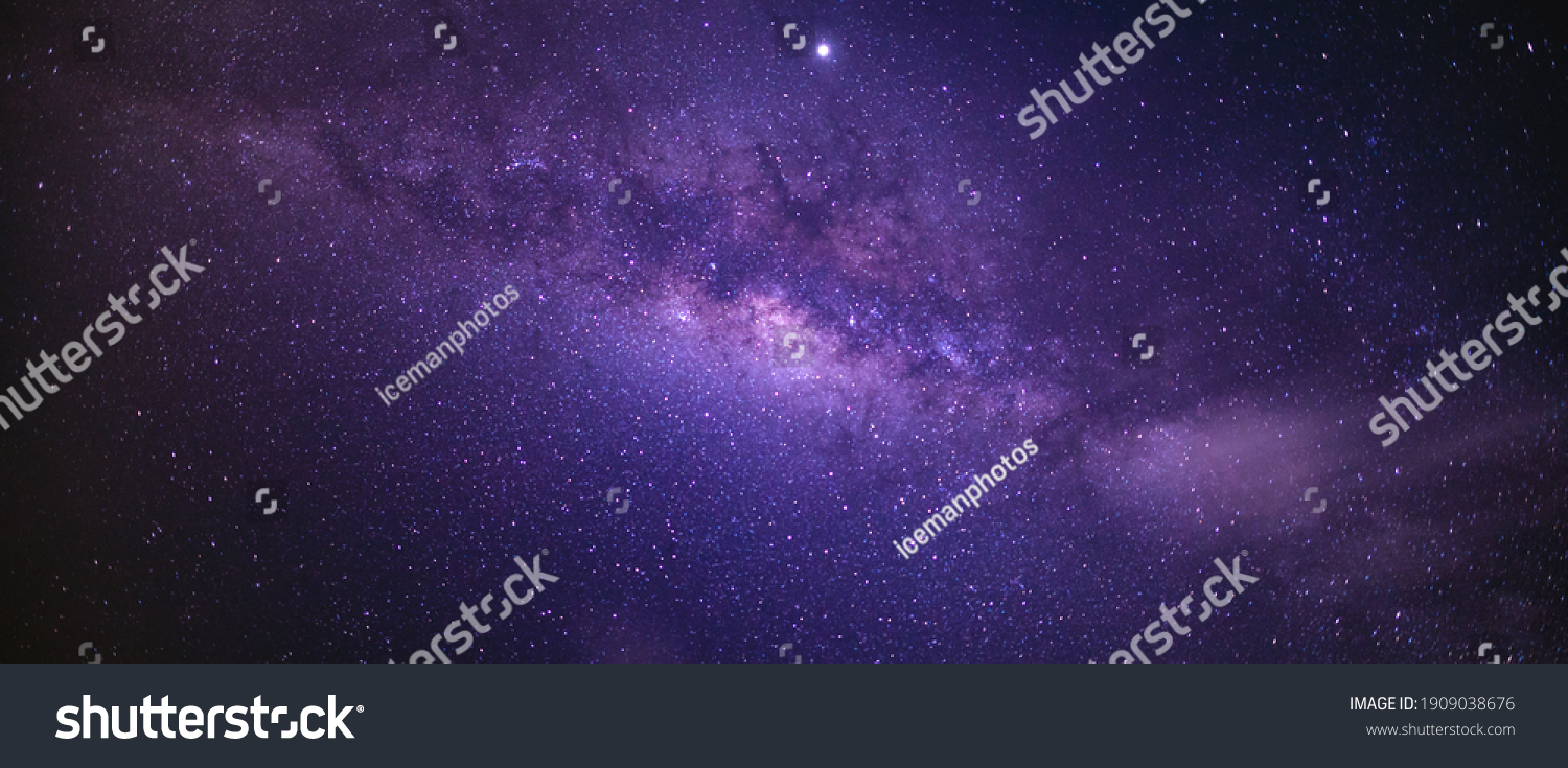 Panorama view universe space shot of milky way galaxy with stars on a night sky background. The Milky Way is the galaxy that contains our Solar System. #1909038676
