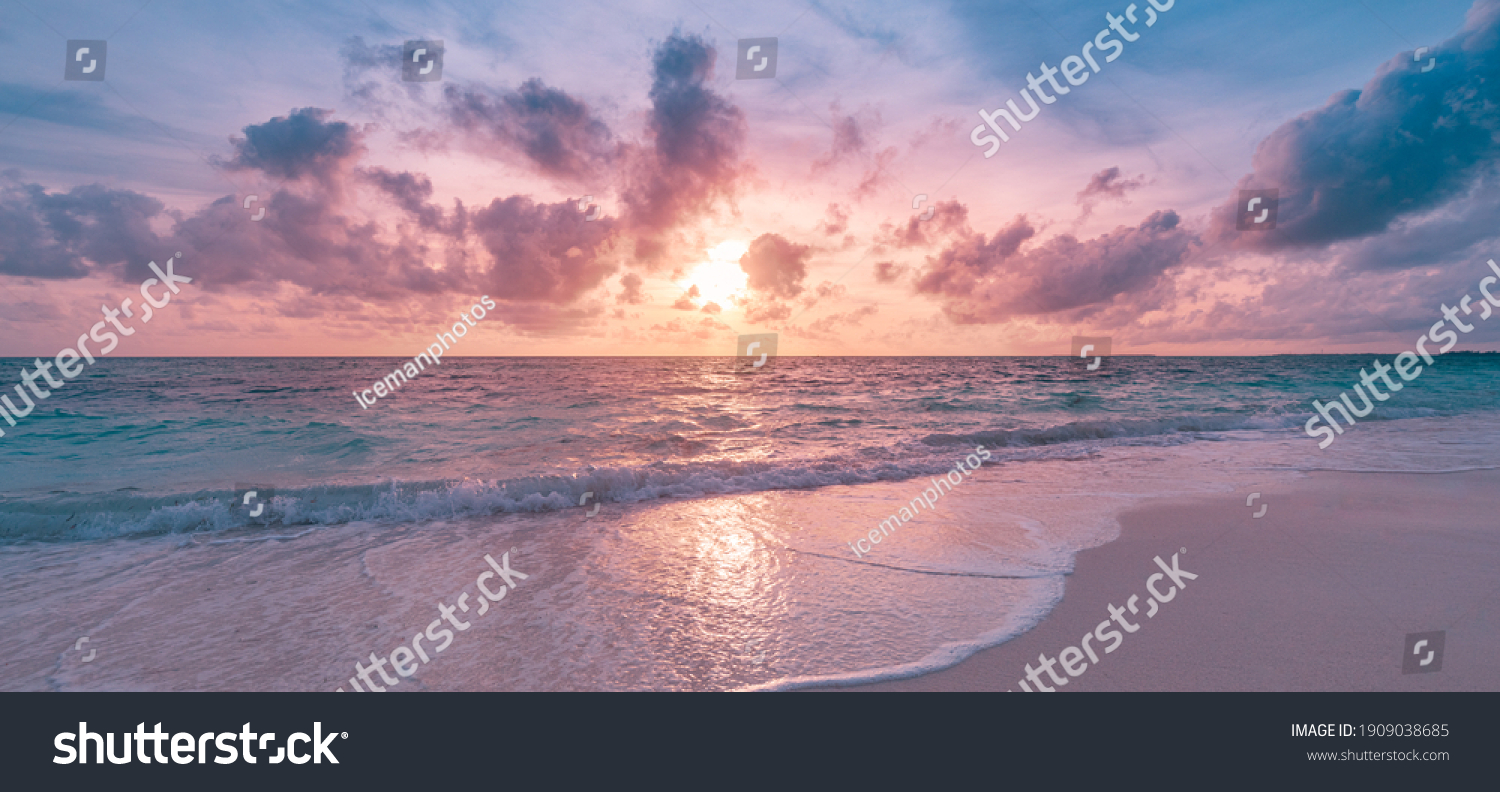 Closeup sea sand beach. Panoramic beach landscape. Inspire tropical beach seascape horizon. Orange and golden sunset sky calmness tranquil relaxing sunlight summer mood. Vacation travel holiday banner #1909038685