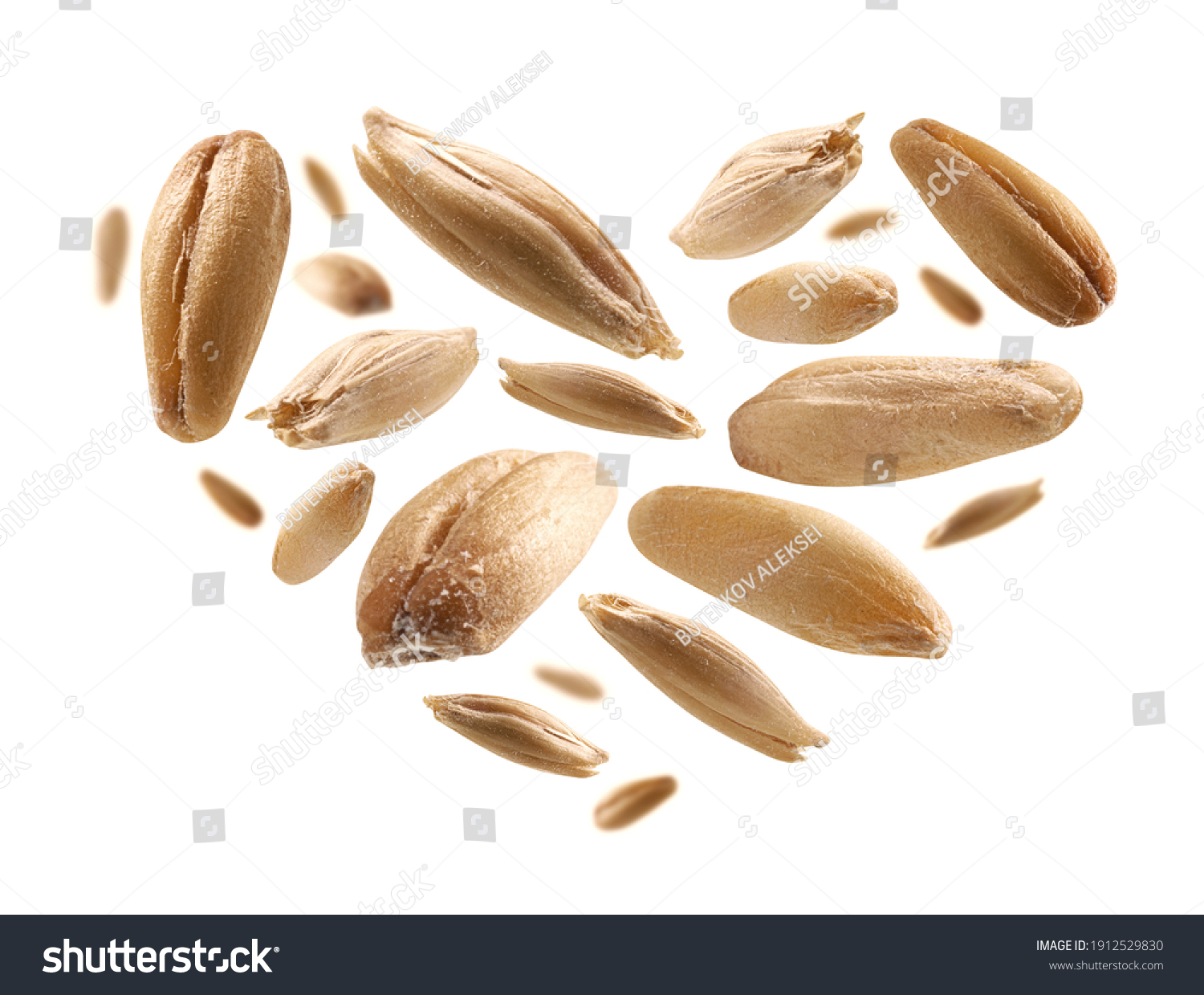 Oat grains in the shape of a heart on a white background #1912529830