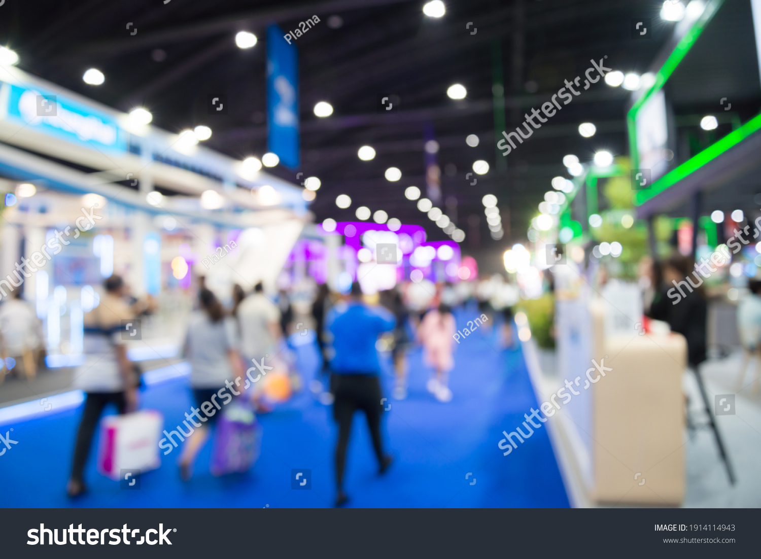 Abstract blur people in exhibition hall event trade show expo background. Large international exhibition, convention center, business marketing and event fair organizer concept. #1914114943