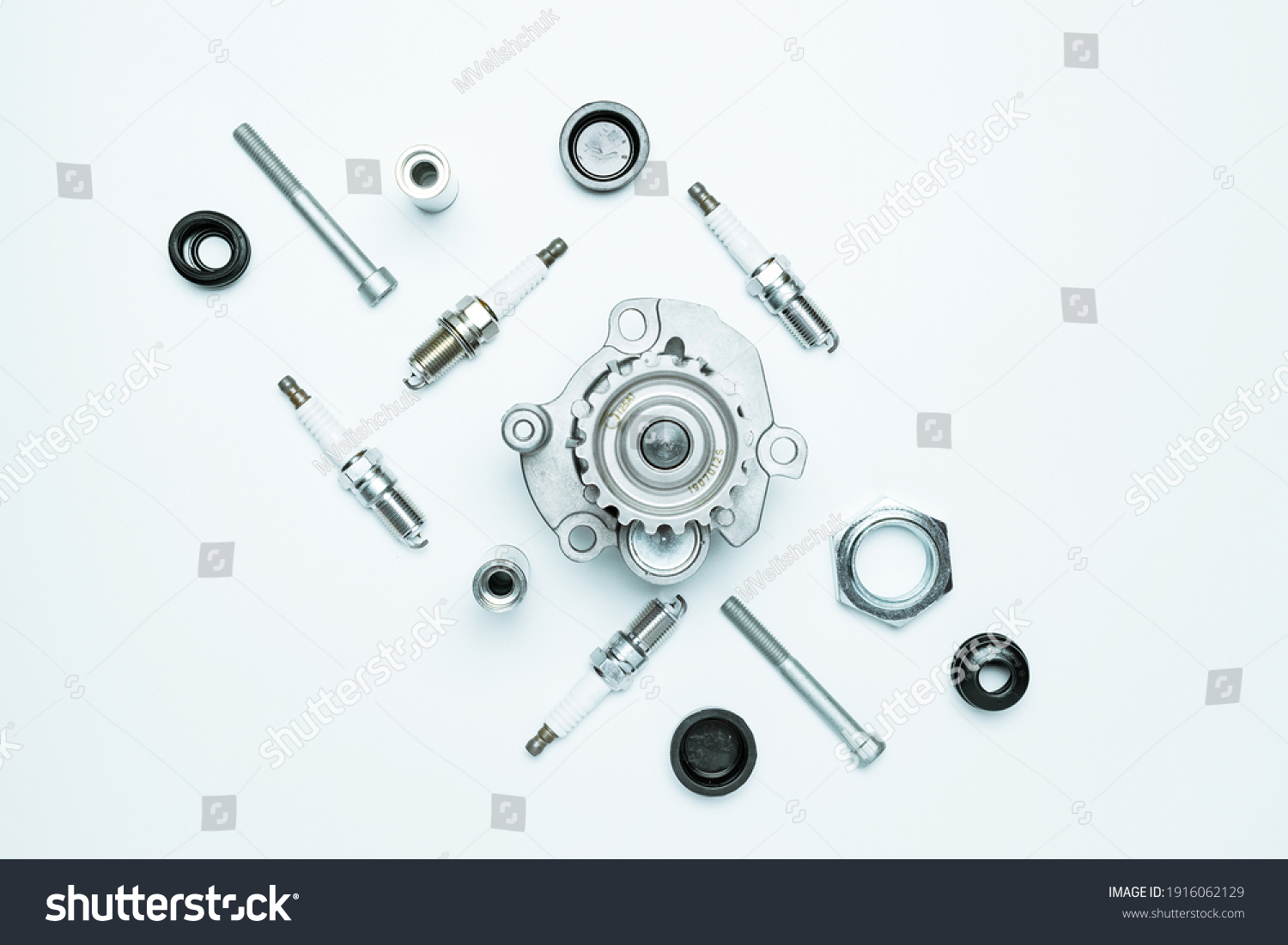 Car motor parts. Auto motor mechanic spare or automotive piece on white background. Set of new metal car part. Flat lay, top view, copy space #1916062129